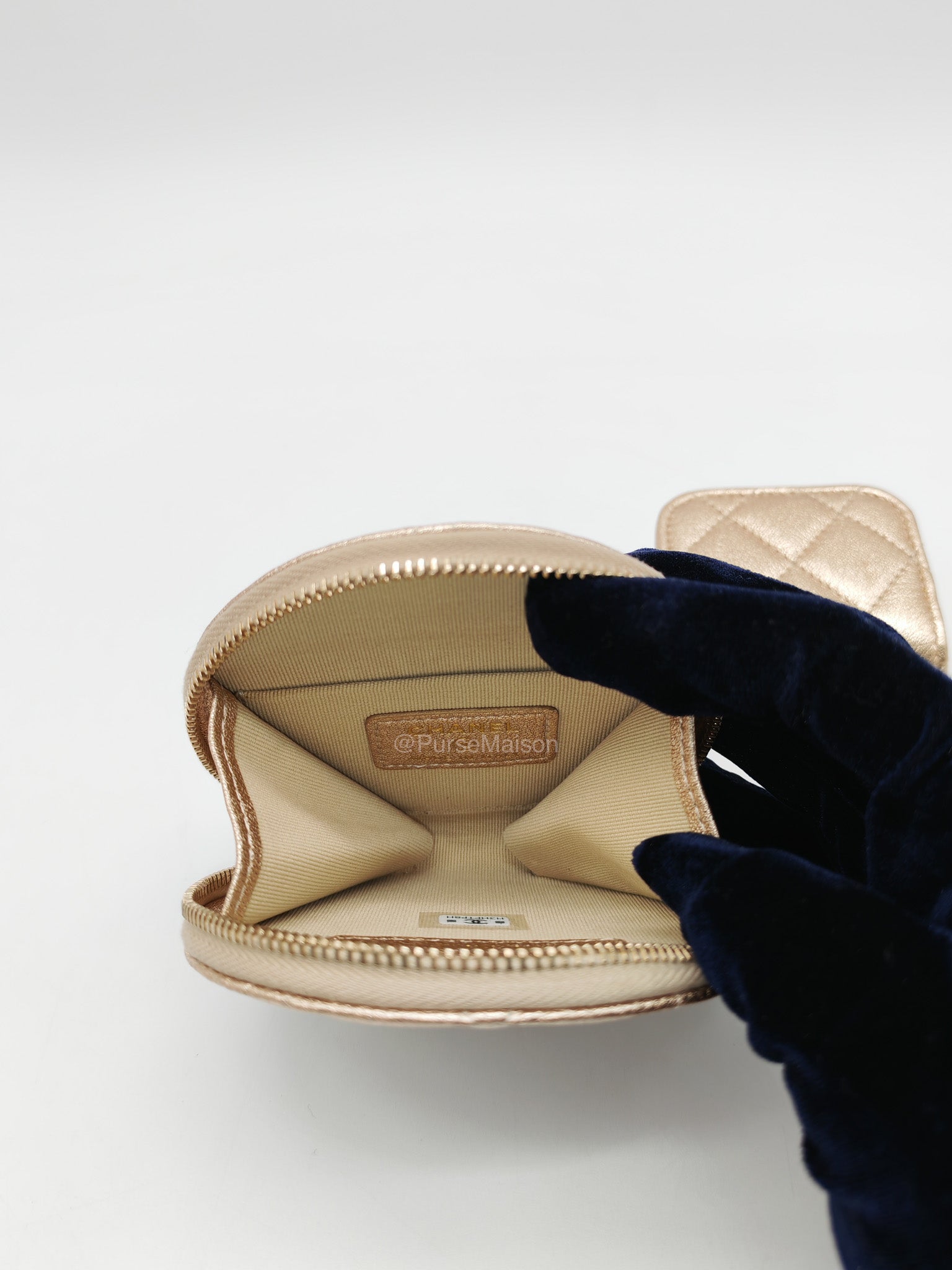 Chanel Round Clip-on Coin Purse and Airpods Case Set in Metallic Gold Quilted Lambskin Leather and Light Gold Hardware Microchip | Purse Maison Luxury Bags Shop