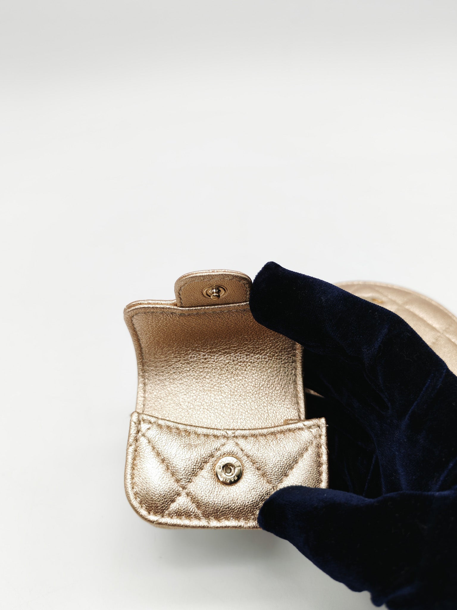 Chanel Round Clip-on Coin Purse and Airpods Case Set in Metallic Gold Quilted Lambskin Leather and Light Gold Hardware Microchip | Purse Maison Luxury Bags Shop