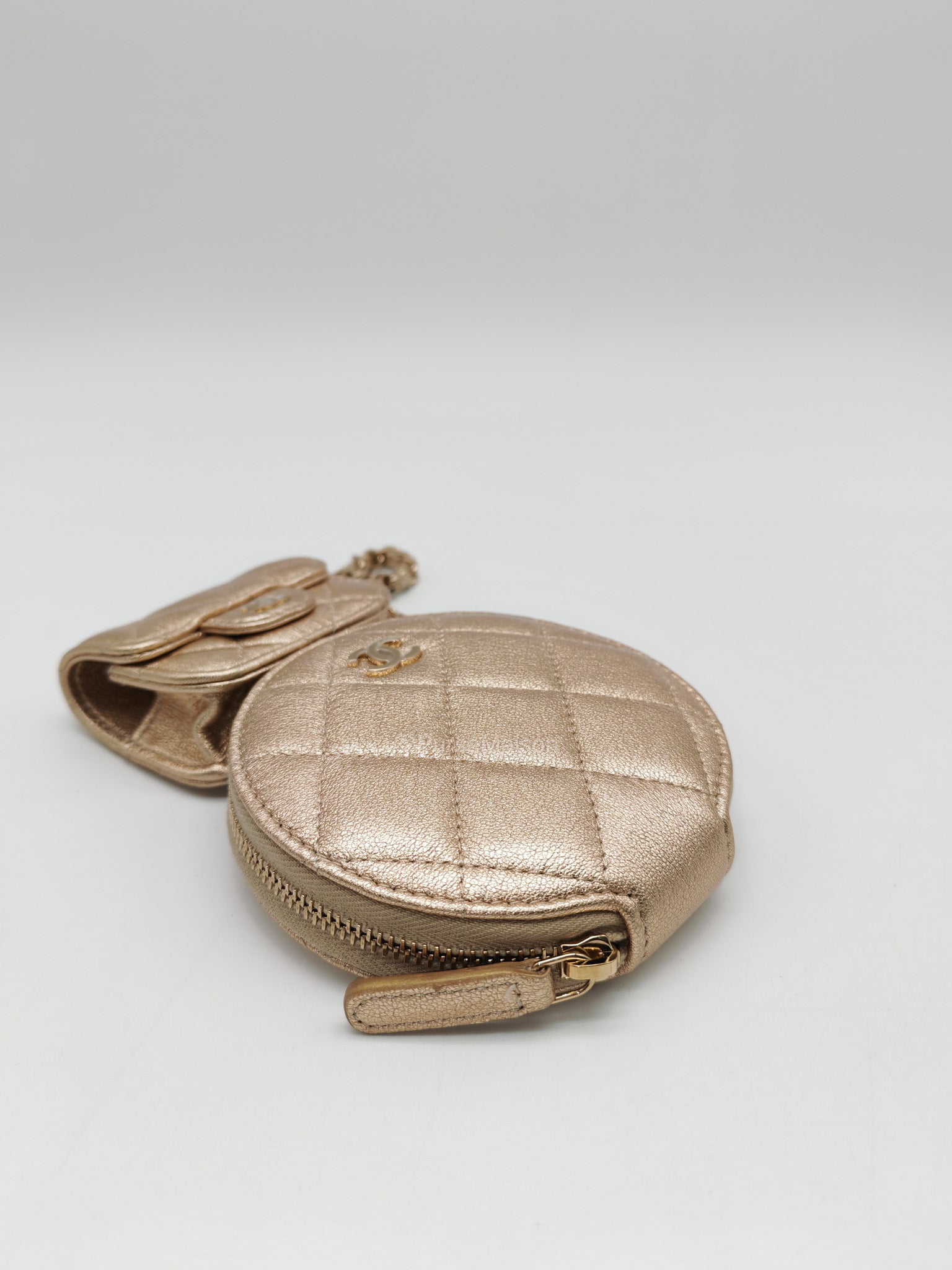 Chanel Round Clip-on Coin Purse and Airpods Case Set in Metallic Gold Quilted Lambskin Leather and Light Gold Hardware Microchip | Purse Maison Luxury Bags Shop