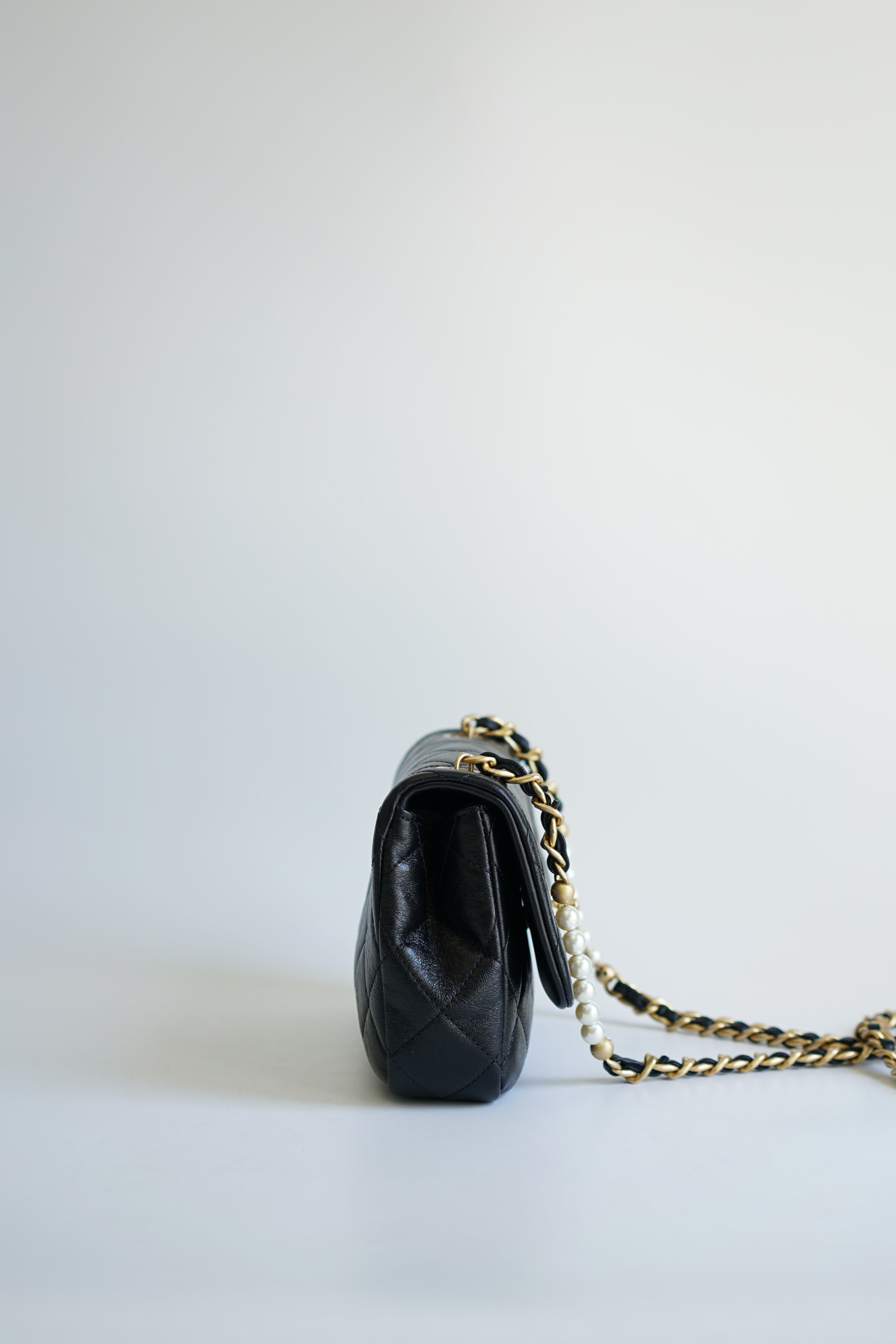 Chanel Seasonal Mini Flap Pearl CC and Chain in Black Calfskin and Aged Gold Hardware (Microchip)