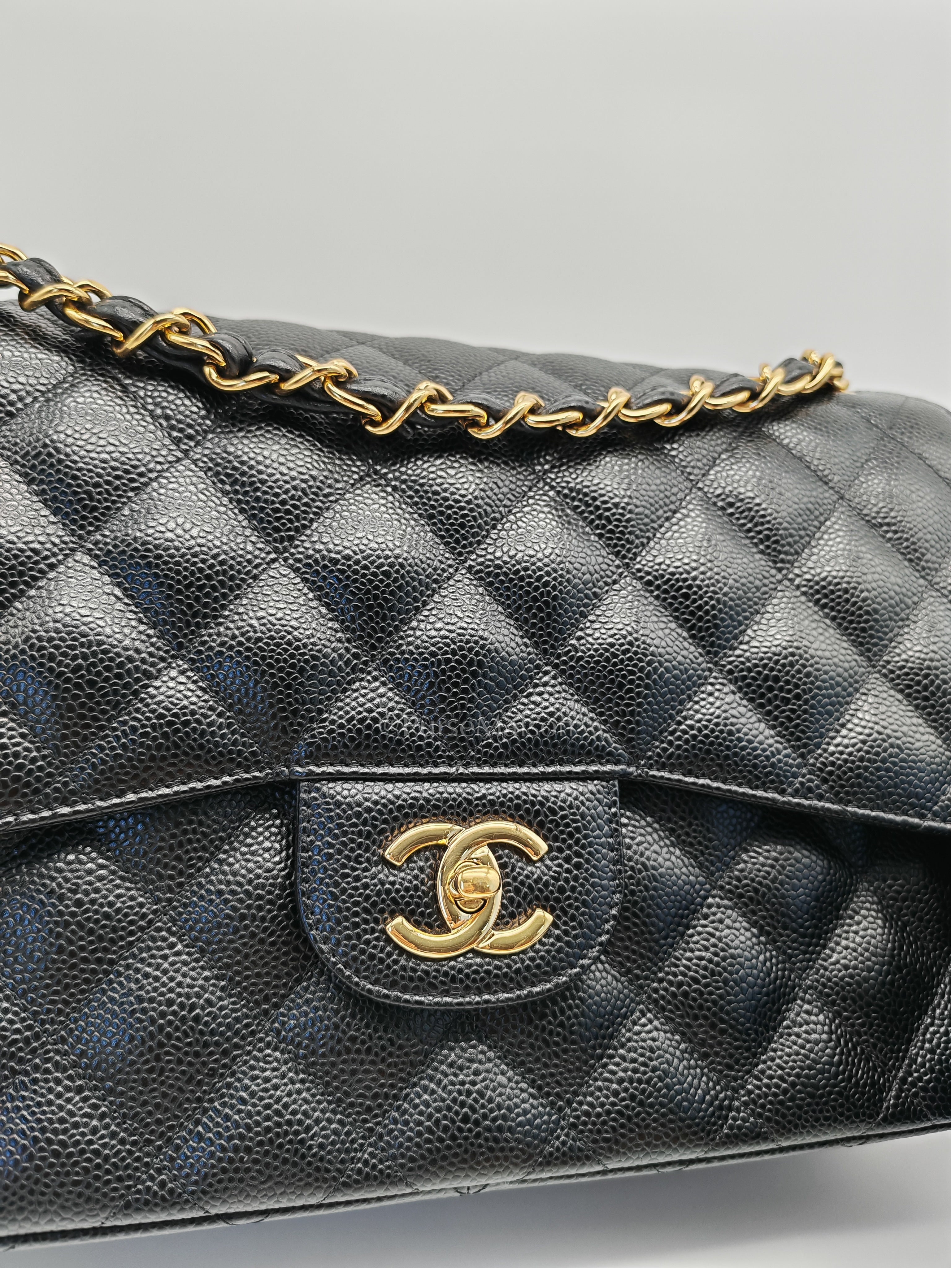 Classic Double Flap Jumbo Black Caviar Leather in Gold Hardware (Series 24) | Purse Maison Luxury Bags Shop
