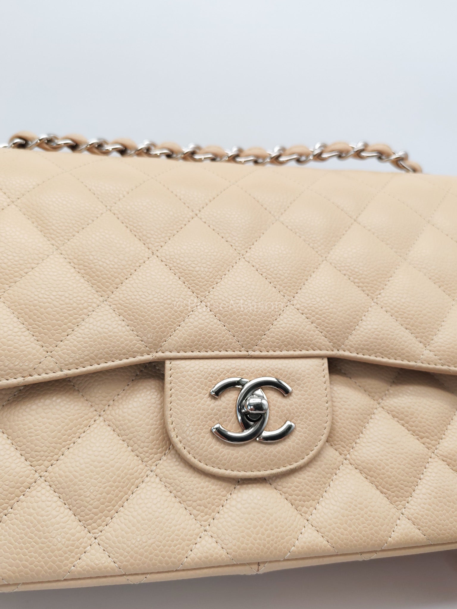 Classic Double Flap Jumbo in Beige Quilted Caviar Leather and Silver Hardware Series 14 | Purse Maison Luxury Bags Shop