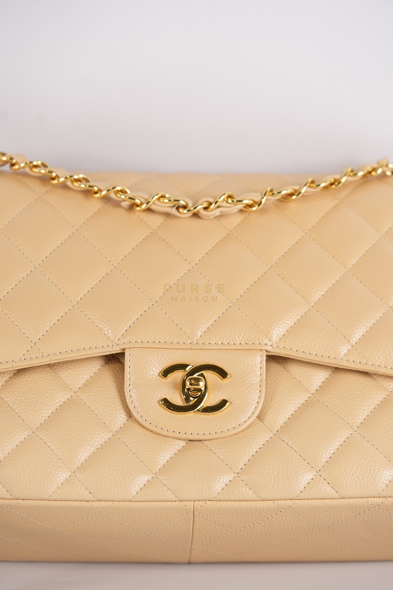 Classic Double Flap Jumbo in Beige Quilted Caviar Leather & Gold Hardware Series 23 | Purse Maison Luxury Bags Shop