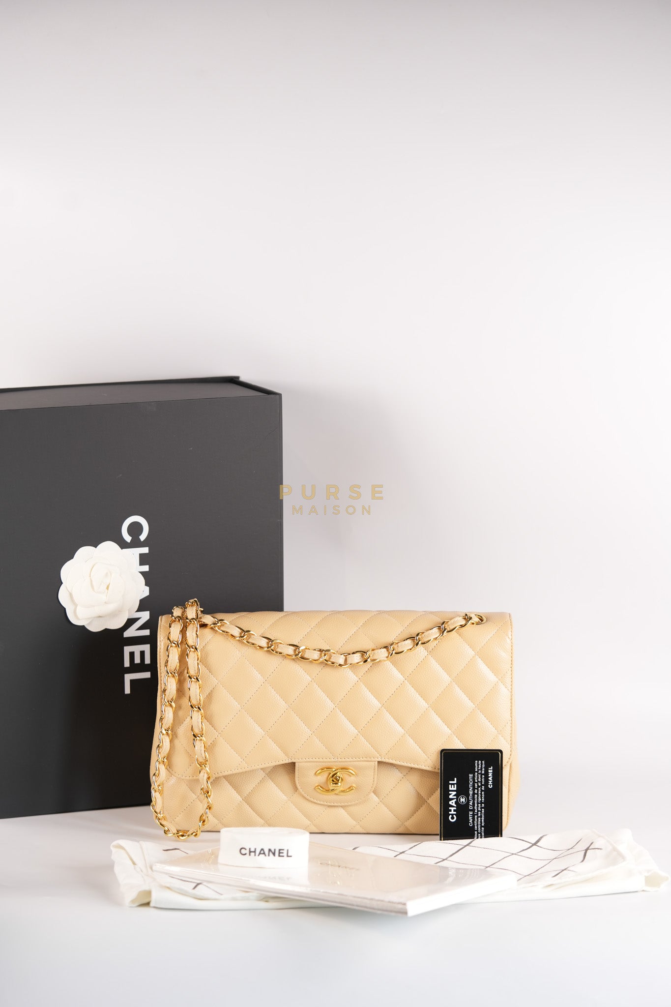 Classic Double Flap Jumbo in Beige Quilted Caviar Leather & Gold Hardware Series 23 | Purse Maison Luxury Bags Shop