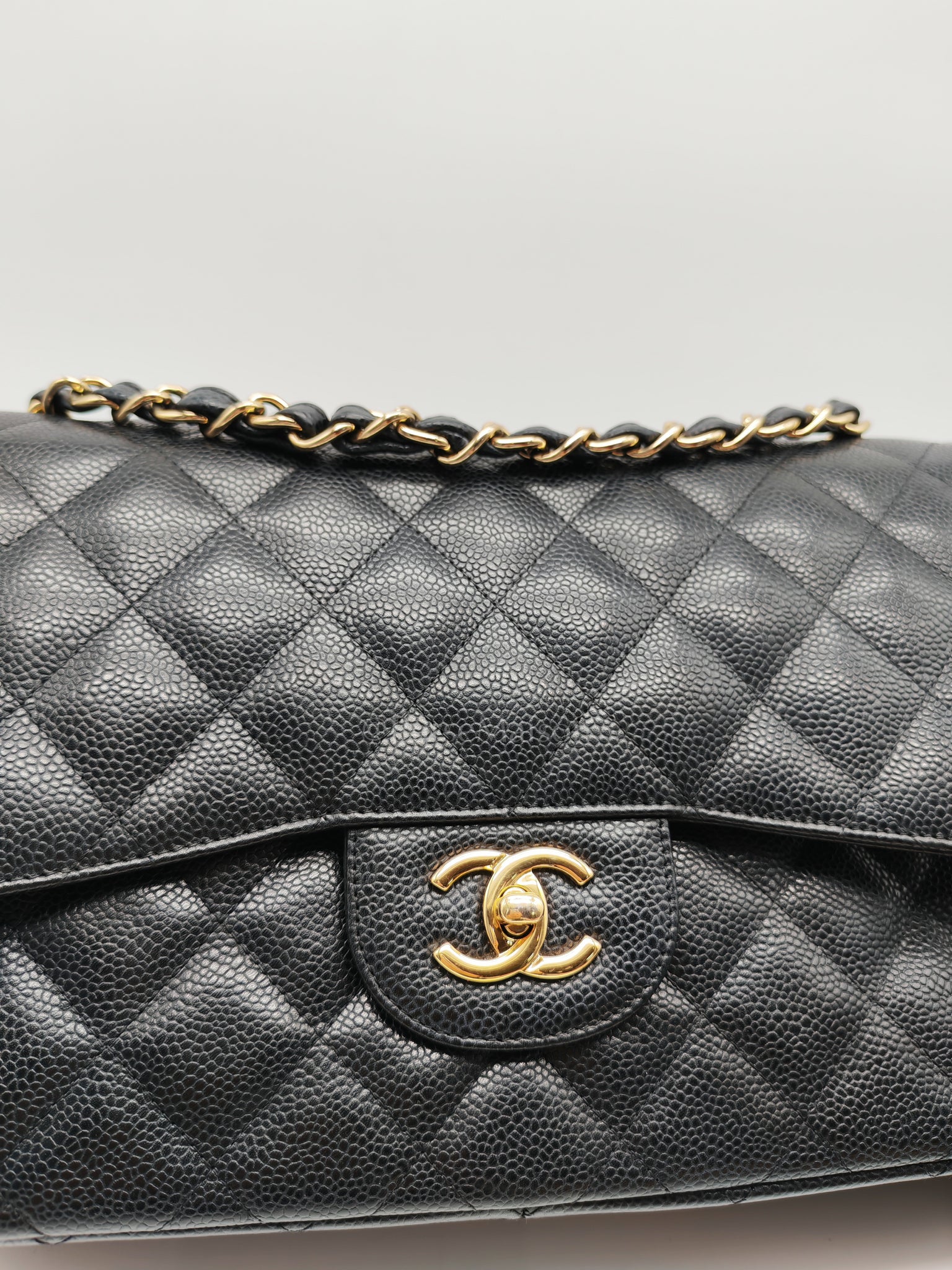 Classic Double Flap Jumbo in Black Caviar Leather and Gold Hardware Series 14 | Purse Maison Luxury Bags Shop