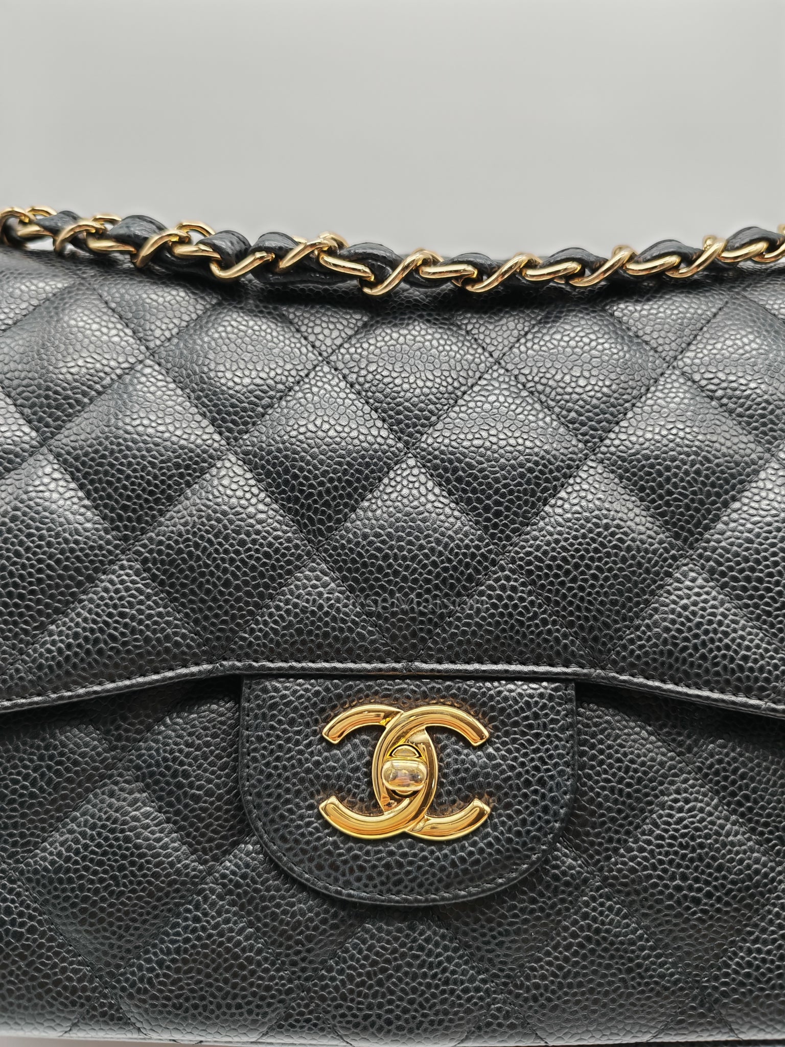 Classic Double Flap Jumbo in Black Caviar Leather and Gold Hardware Series 14 | Purse Maison Luxury Bags Shop