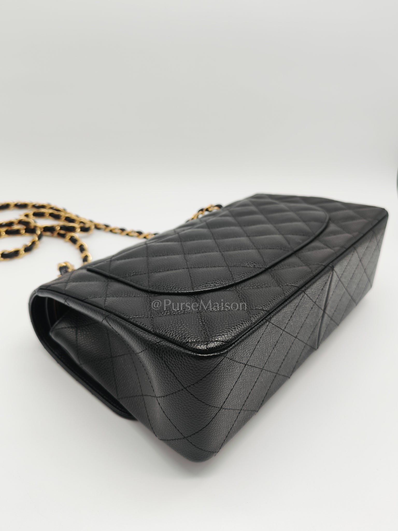 Classic Double Flap Jumbo in Black Caviar Leather and Gold Hardware Series 25 | Purse Maison Luxury Bags Shop