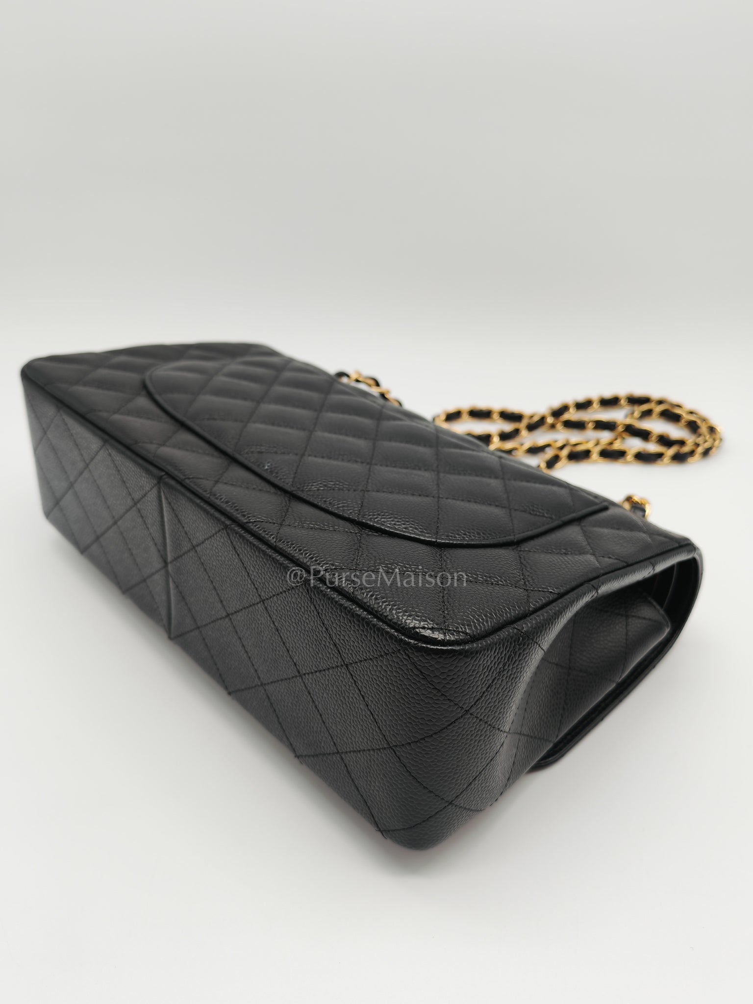 Classic Double Flap Jumbo in Black Caviar Leather and Gold Hardware Series 25 | Purse Maison Luxury Bags Shop