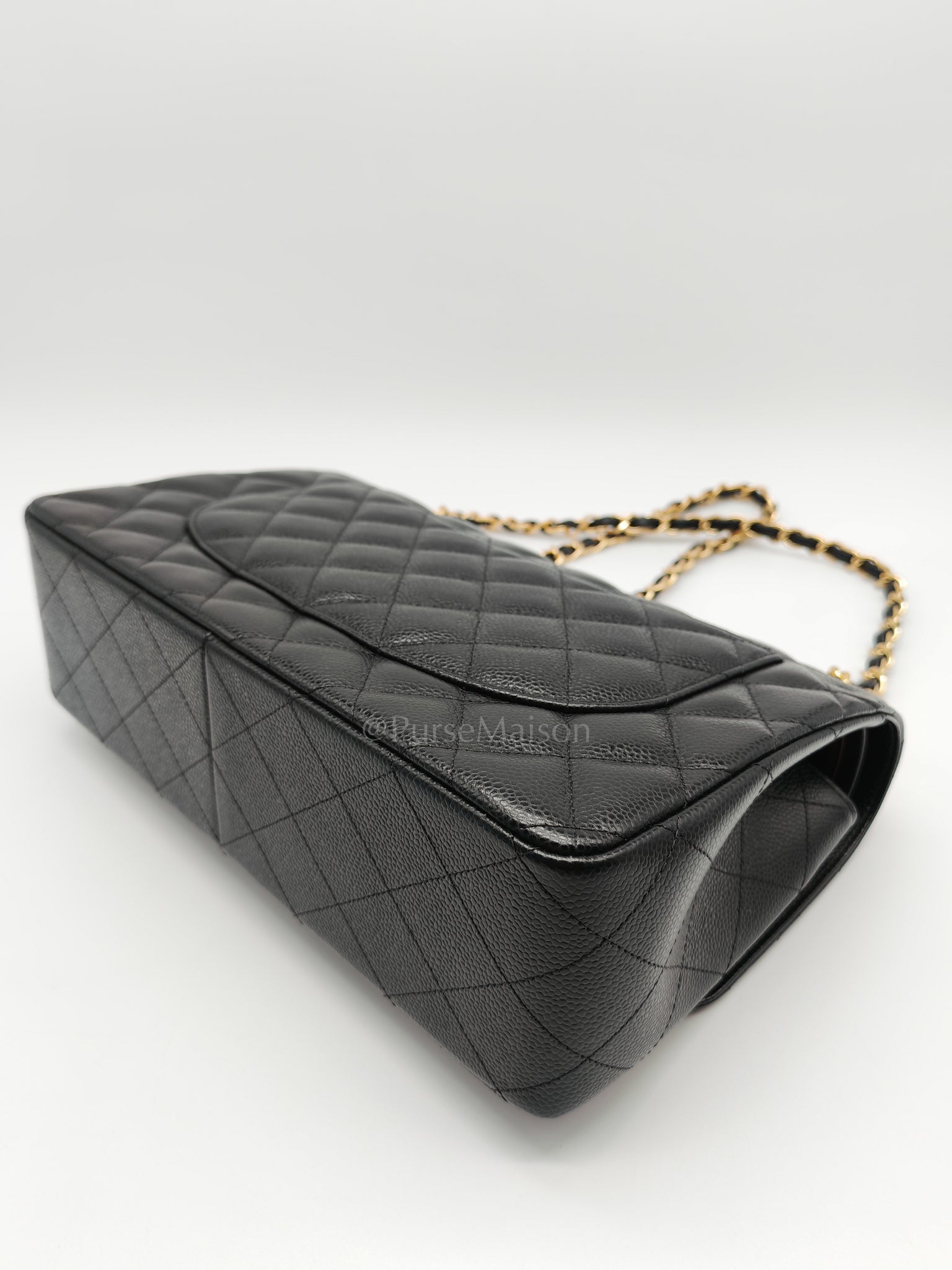Classic Double Flap Jumbo in Black Caviar Leather and Gold Hardware Series 25 | Purse Maison Luxury Bags Shop
