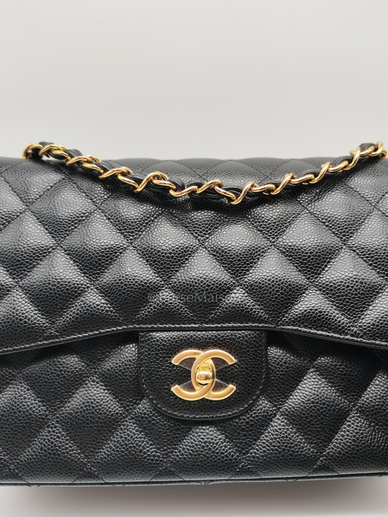 Classic Double Flap Jumbo in Black Caviar Leather and Gold Hardware Series 25 | Purse Maison Luxury Bags Shop