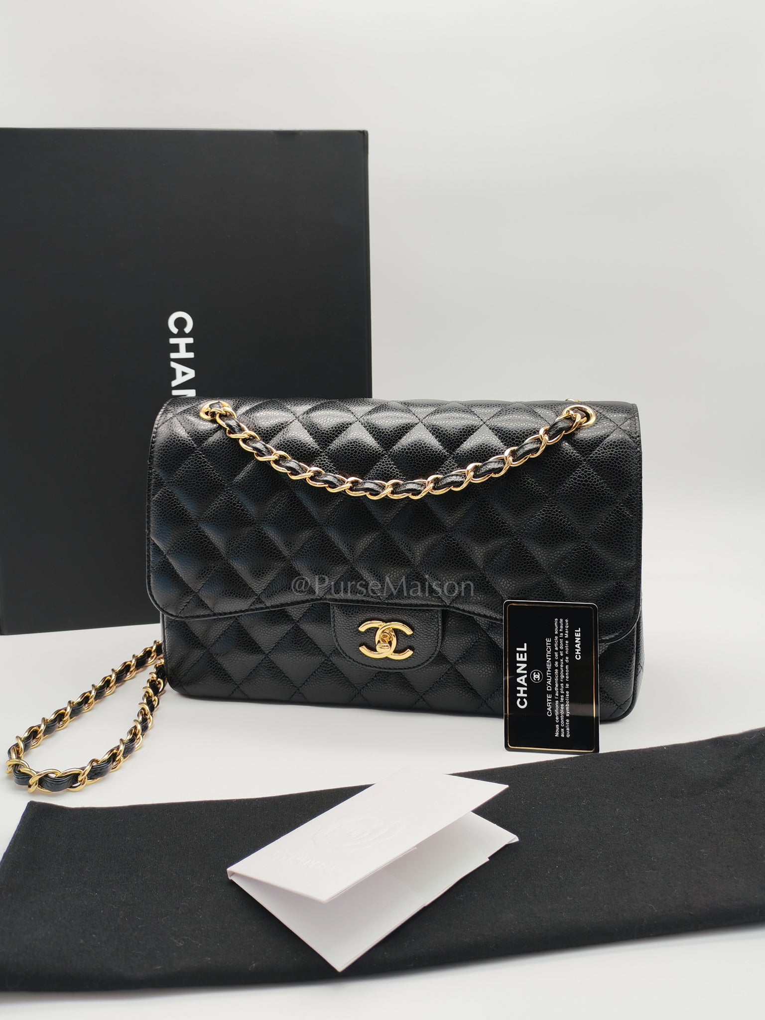 Classic Double Flap Jumbo in Black Caviar Leather and Gold Hardware Series 25 | Purse Maison Luxury Bags Shop