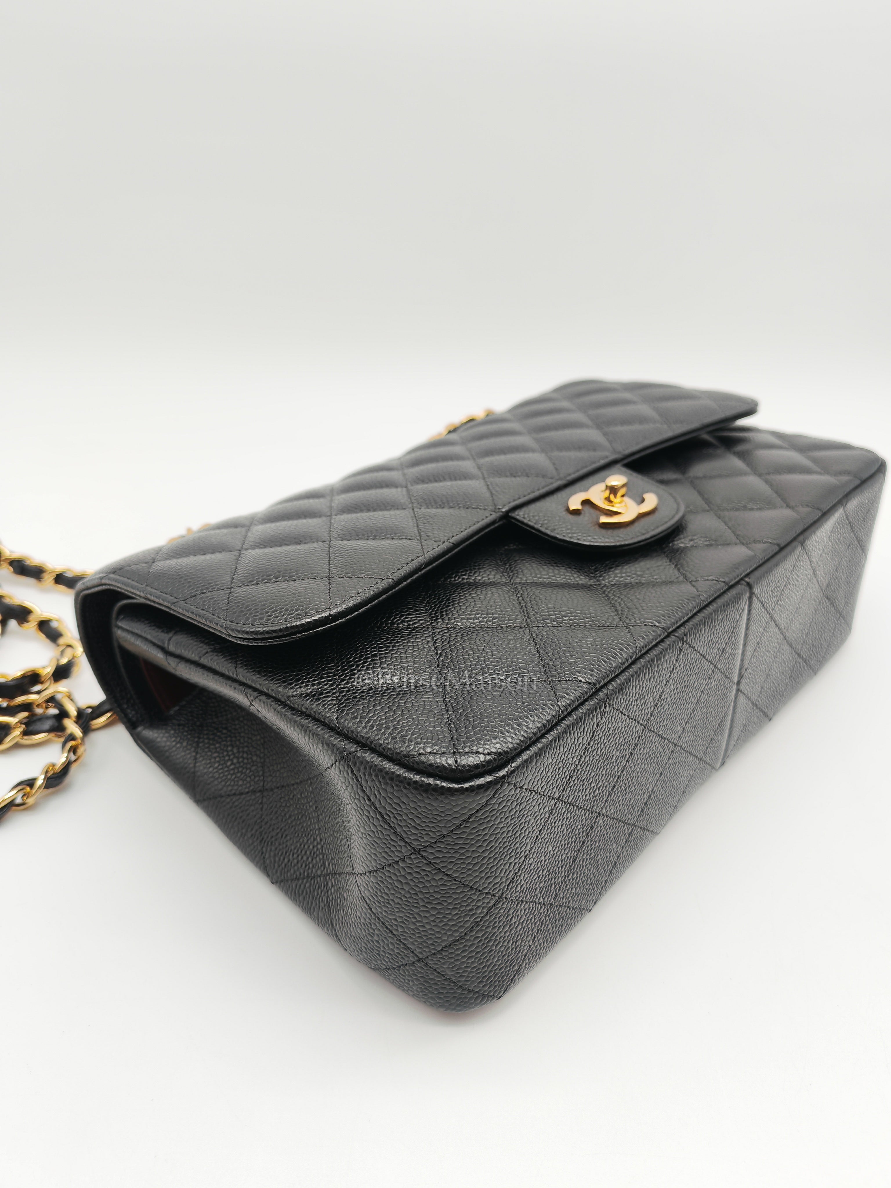 Classic Double Flap Jumbo in Black Caviar Leather and Gold Hardware Series 27 | Purse Maison Luxury Bags Shop