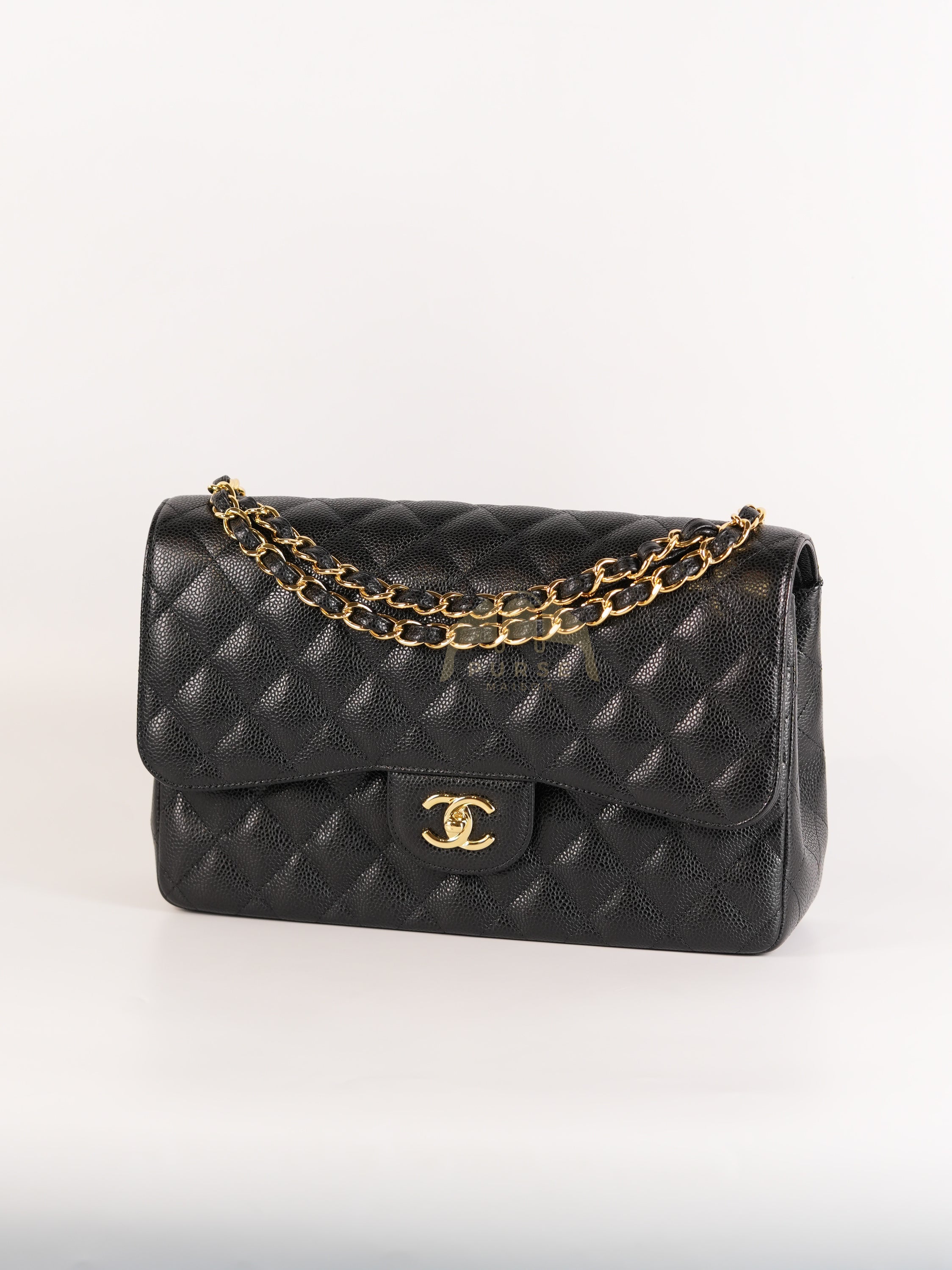 Classic Double Flap Jumbo in Black Quilted Caviar Leather and Gold Hardware Series 26 | Purse Maison Luxury Bags Shop