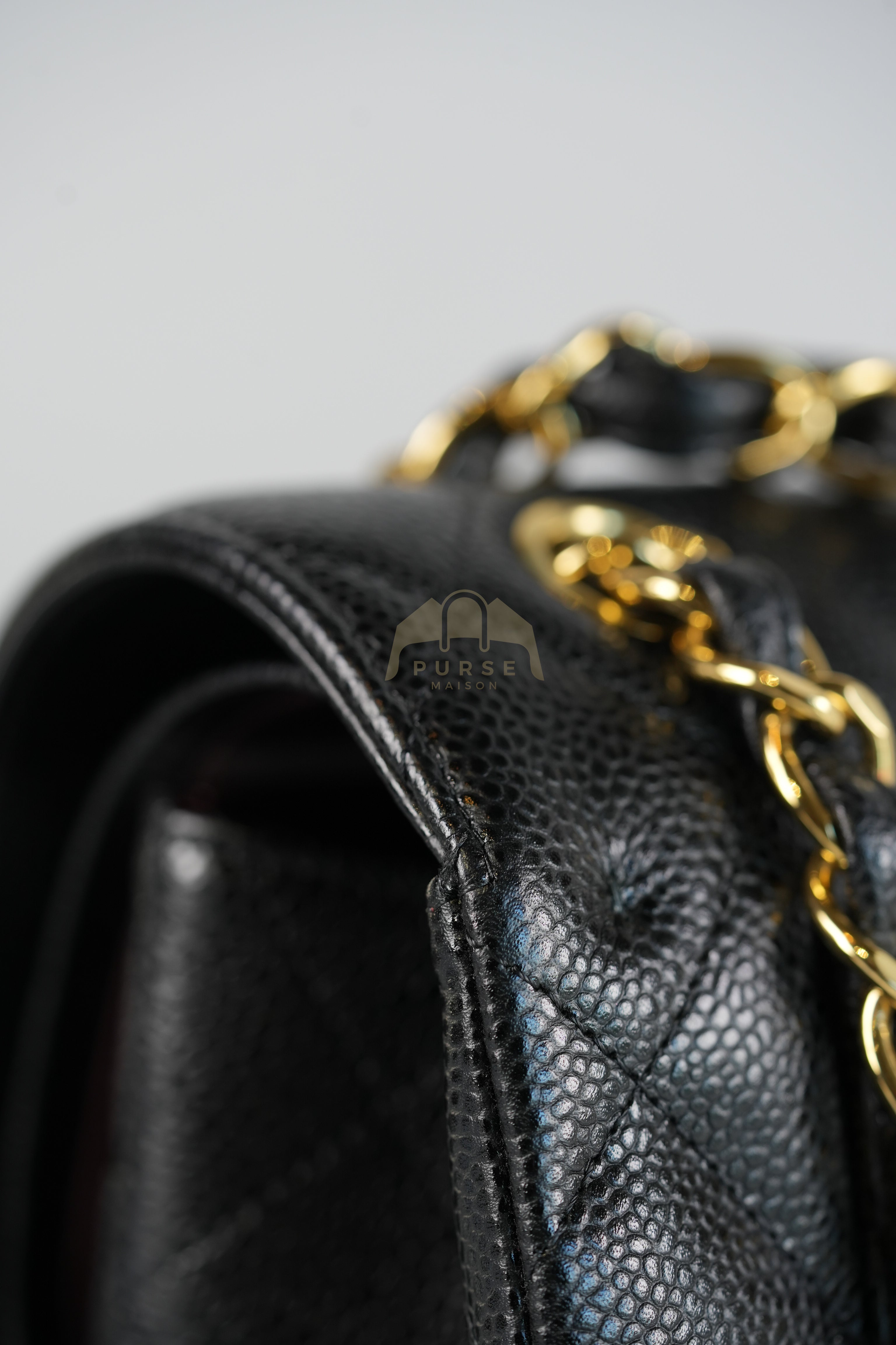 Classic Double Flap Jumbo in Black Quilted Caviar Leather and Gold Hardware Series 26 | Purse Maison Luxury Bags Shop