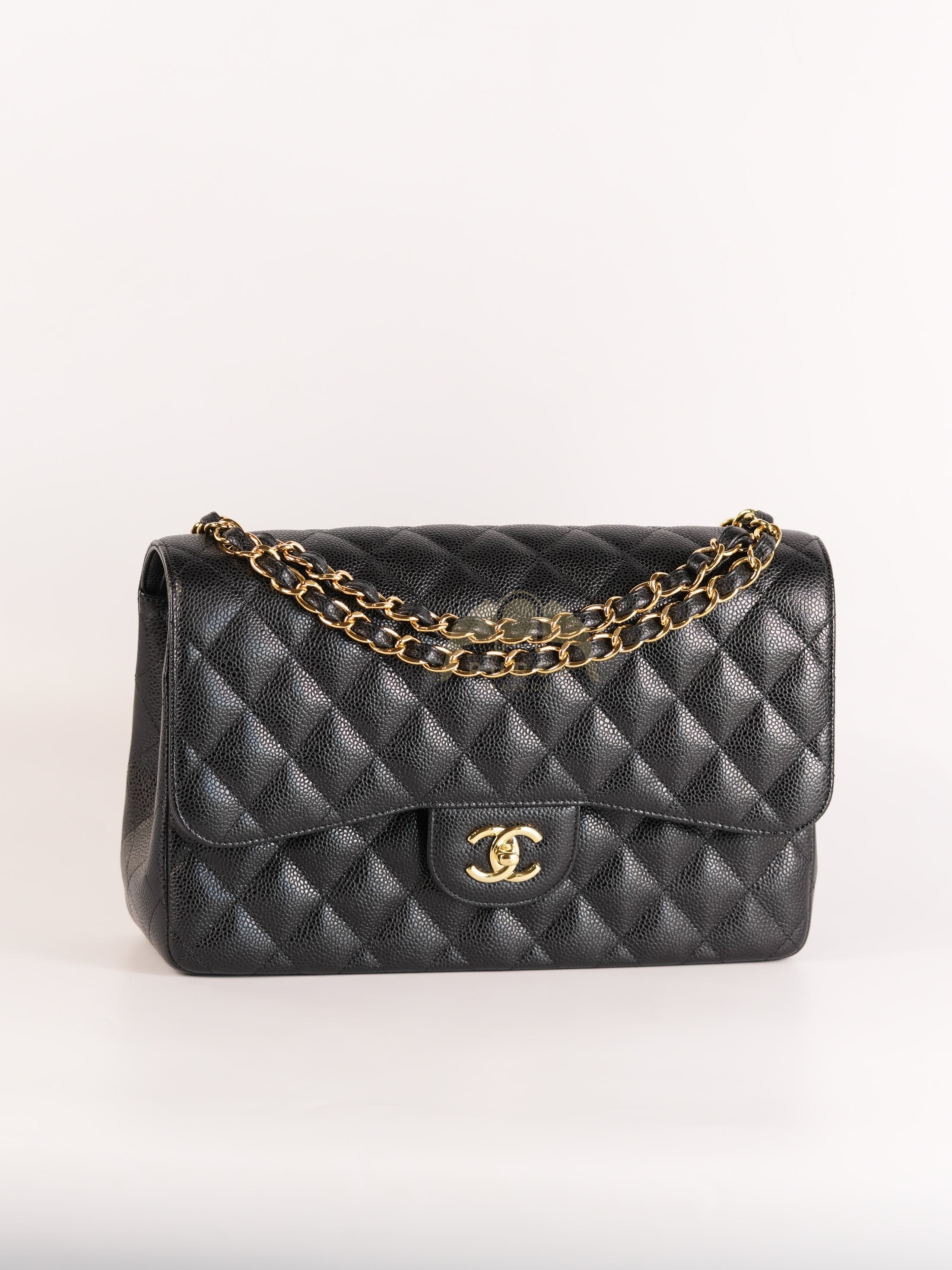 Classic Double Flap Jumbo in Black Quilted Caviar Leather and Gold Hardware Series 26 | Purse Maison Luxury Bags Shop