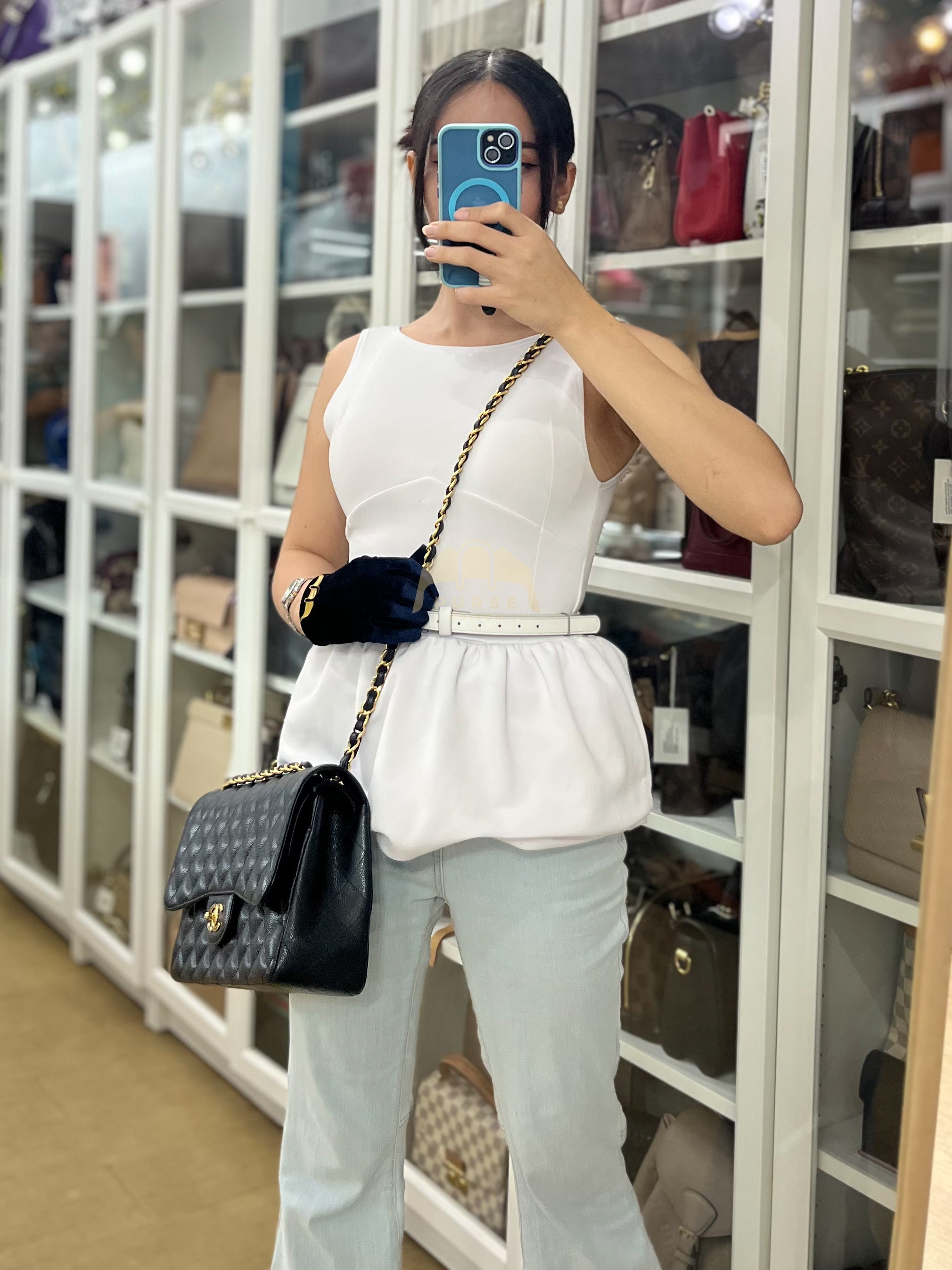 Classic Double Flap Jumbo in Black Quilted Caviar Leather and Gold Hardware Series 26 | Purse Maison Luxury Bags Shop