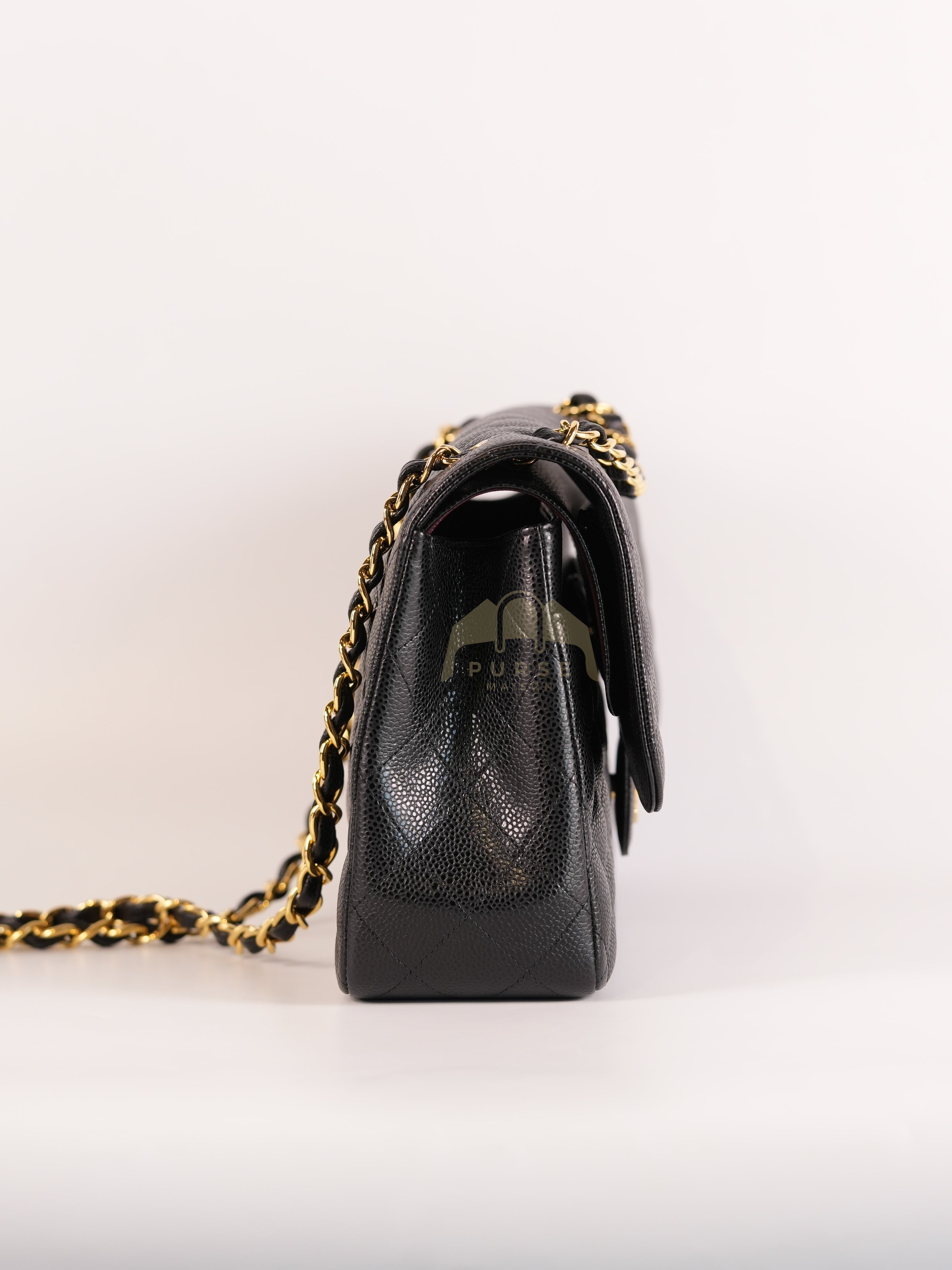 Classic Double Flap Jumbo in Black Quilted Caviar Leather and Gold Hardware Series 26 | Purse Maison Luxury Bags Shop