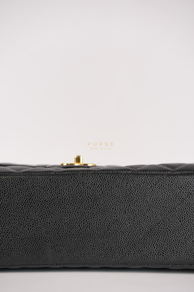 Classic Double Flap Maxi in Black Caviar Leather and Gold Hardware Series 15 | Purse Maison Luxury Bags Shop