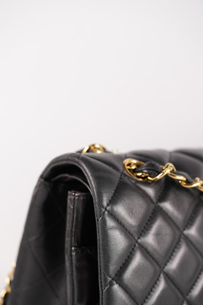 Classic Double Flap Maxi in Black Lambskin Leather and Gold Hardware Series 14 | Purse Maison Luxury Bags Shop