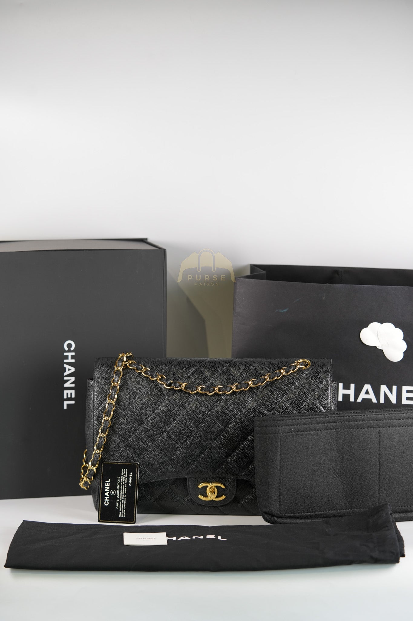 Classic Double Flap Maxi in Black Quilted Caviar Leather & Gold Hardware Series 15 | Purse Maison Luxury Bags Shop