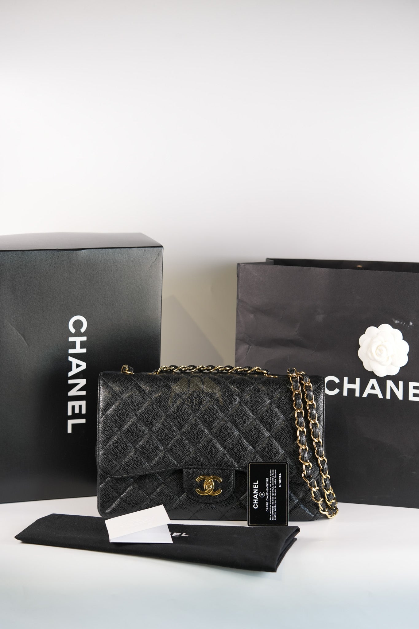 Classic Single Flap Jumbo in Black Caviar Leather Gold Hardware (Series 14) | Purse Maison Luxury Bags Shop