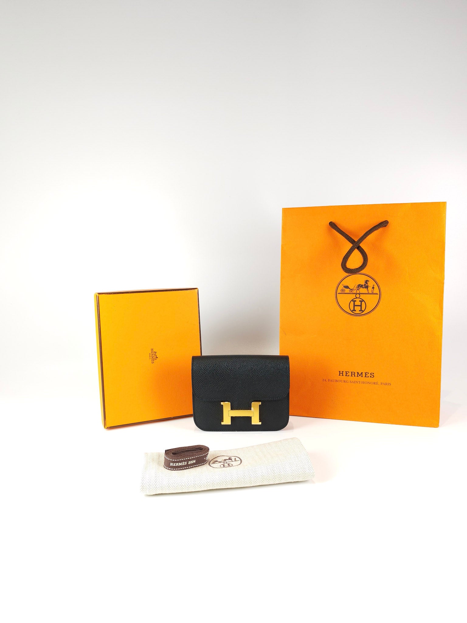 Constance Slim Black in Epsom Leather & Gold Hardware Stamp W (2024) | Purse Maison Luxury Bags Shop