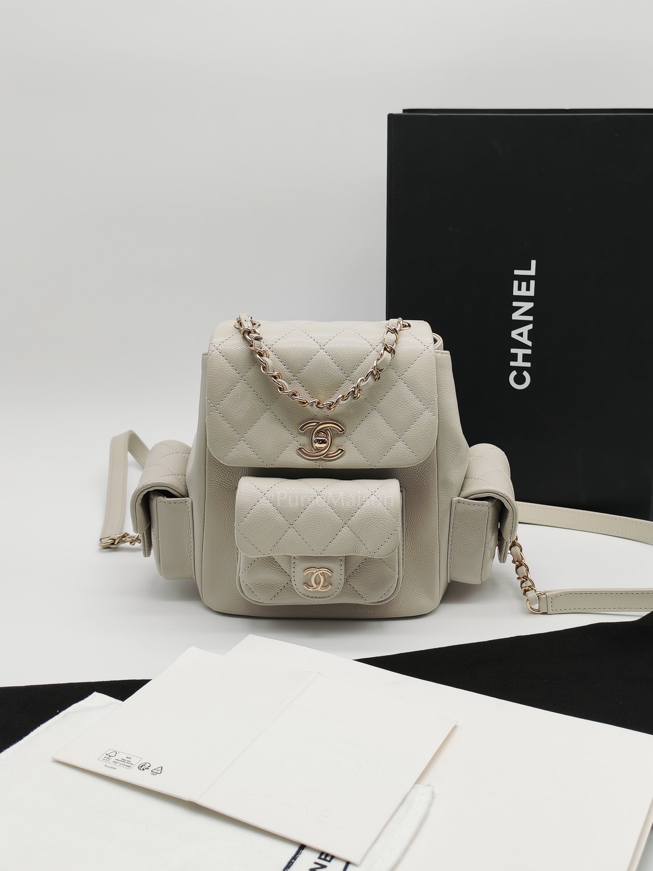 Duma Backpack Small in Gray Caviar Leather & Light Gold Hardware Microchip | Purse Maison Luxury Bags Shop