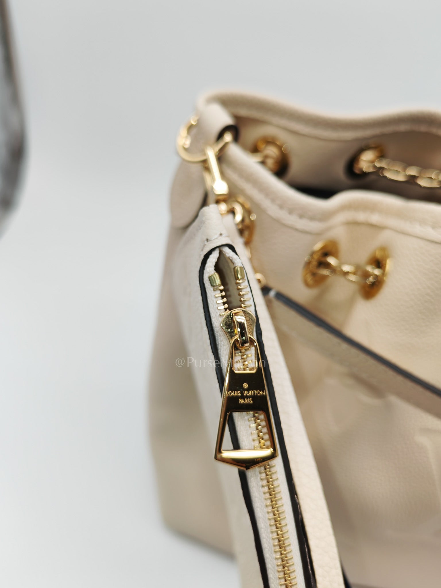 Louis Vuitton Bundle Bag in Cream Monogram Empreinte Giant and Gold Hardware Microchip