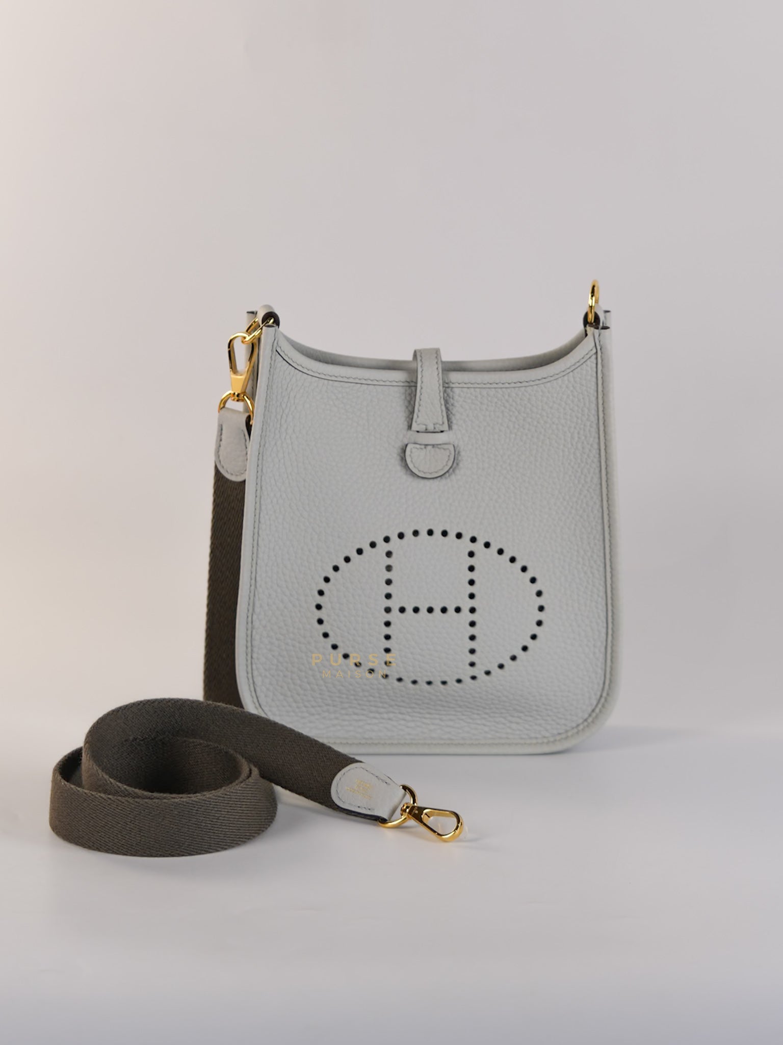 Evelyne TPM in Bleu Pale Taurillon Clemence Leather in Gold Hardware Stamp W (2024) | Purse Maison Luxury Bags Shop