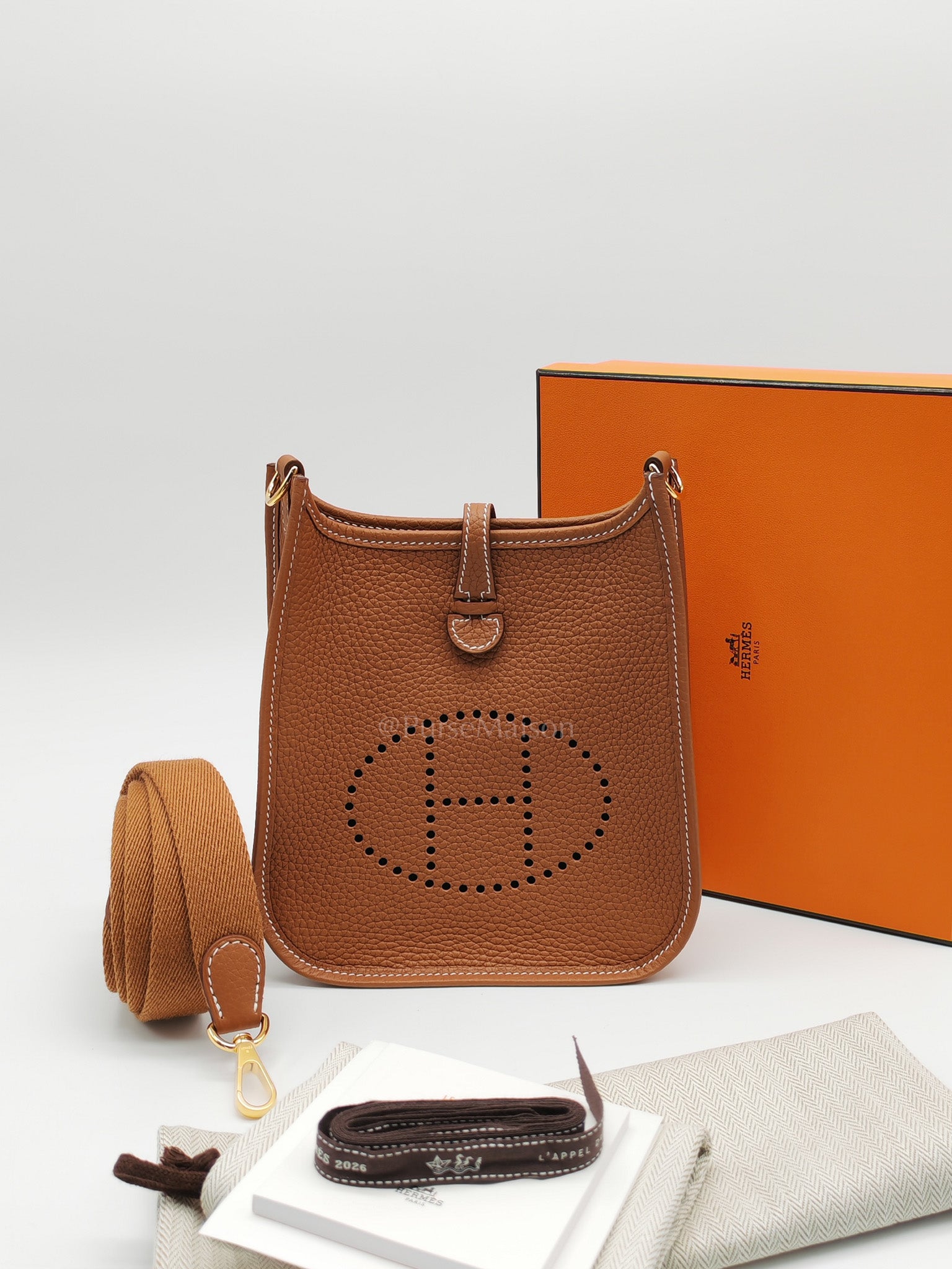 Evelyne TPM In Gold Clemence Leather & Gold Hardware Stamp G (2026) | Purse Maison Luxury Bags Shop
