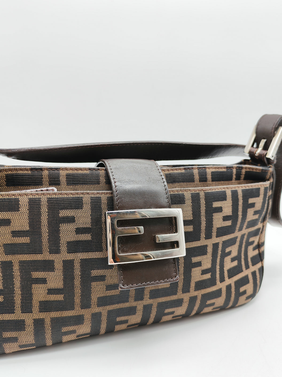 Fendi Baguette Shoulder Bag in FF Monogram Zucca Canvas and Silver Hardware | Purse Maison Luxury Bags Shop
