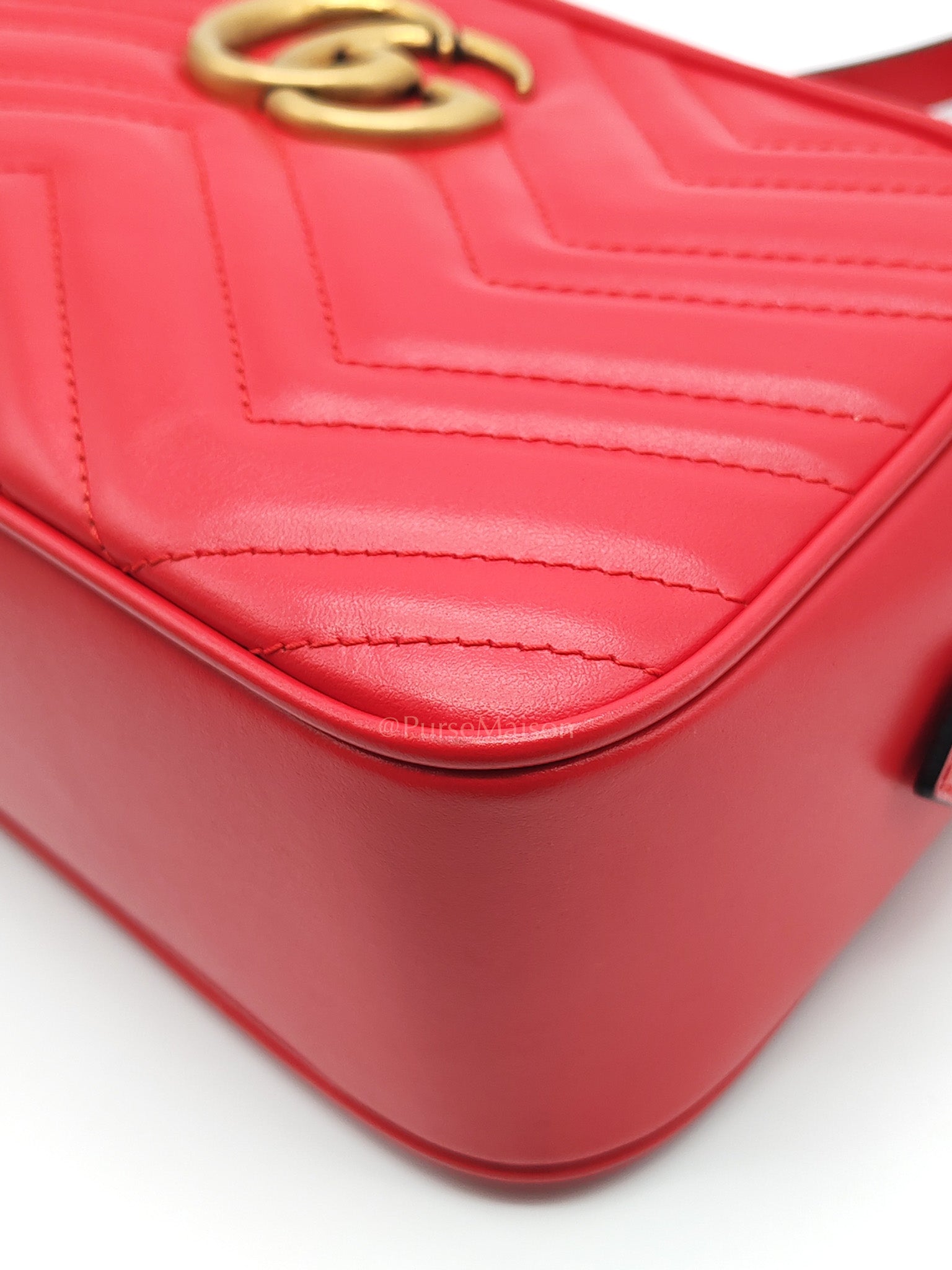 GG Marmont Camera Bag in Red Calfskin Matellase Leather & Aged Gold Hardware | Purse Maison Luxury Bags Shop