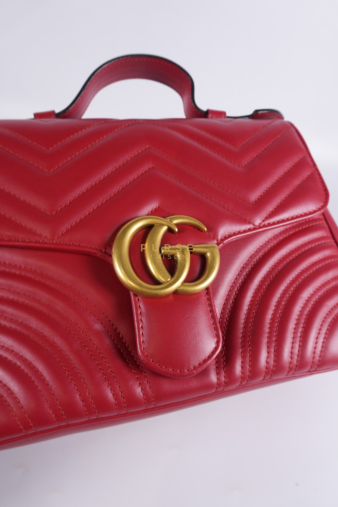 GG Marmont Top Handle Shoulder Bag in Hibiscus Red Calfskin Matelasse Leather & Gold Hardware | Purse Maison Luxury Bags Shop