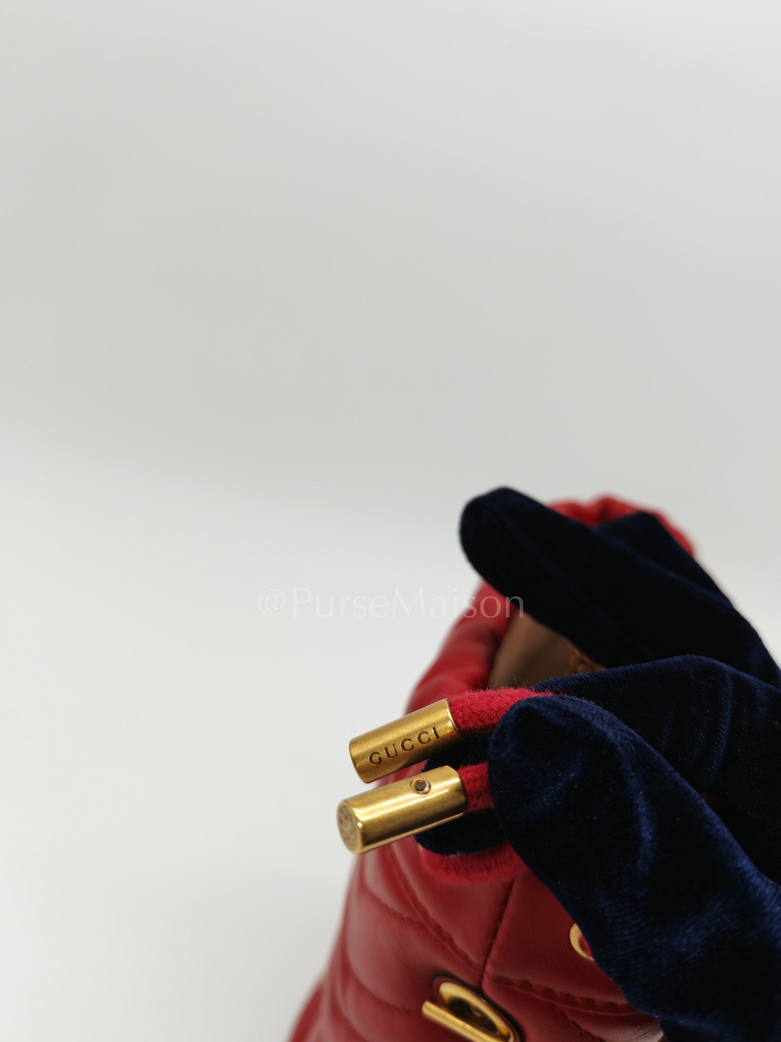 GG Mini Bucket Bag in Red Marmont Matelasse Leather | Purse Maison Luxury Bags Shop