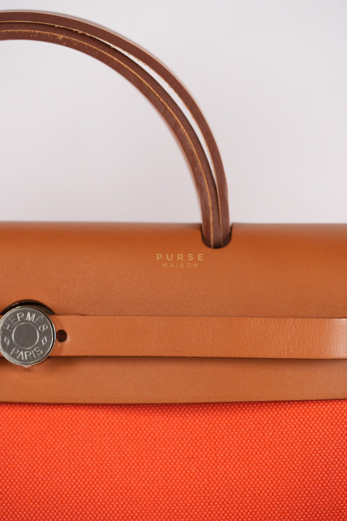 Herbag Zip 31 Capucine Toile H Berline Vache Fauve Hunter Naturel Palladium Hardware Stamp B (2023) | Purse Maison Luxury Bags Shop