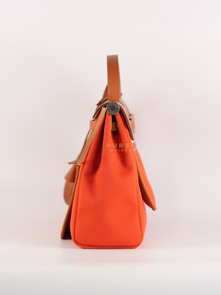 Herbag Zip 31 Capucine Toile H Berline Vache Fauve Hunter Naturel Palladium Hardware Stamp B (2023) | Purse Maison Luxury Bags Shop