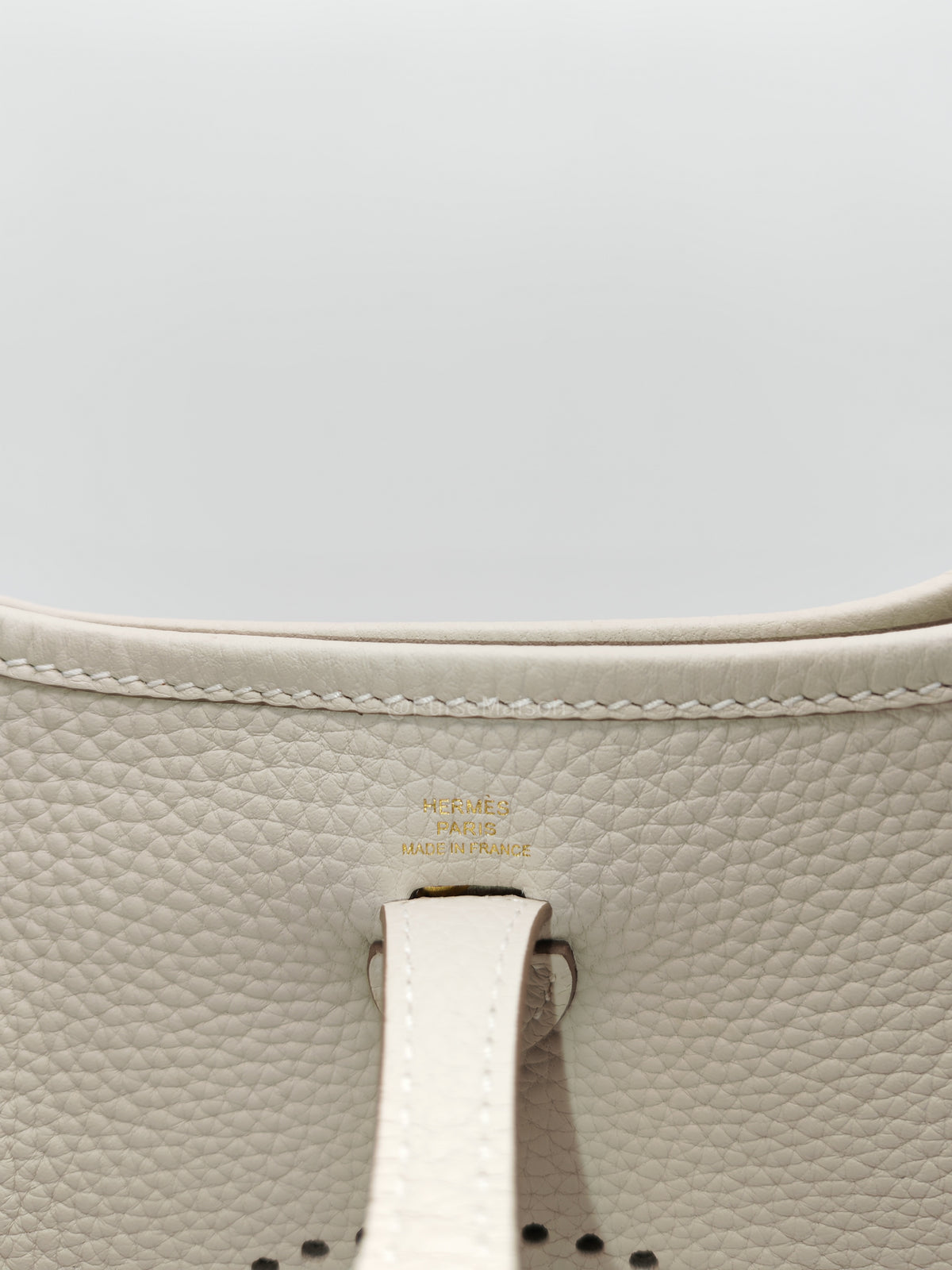 Hermes Mini Evelyne 16 TPM in Craie Clemence Leather and Gold Hardware Stamp W (2024) | Purse Maison Luxury Bags Shop