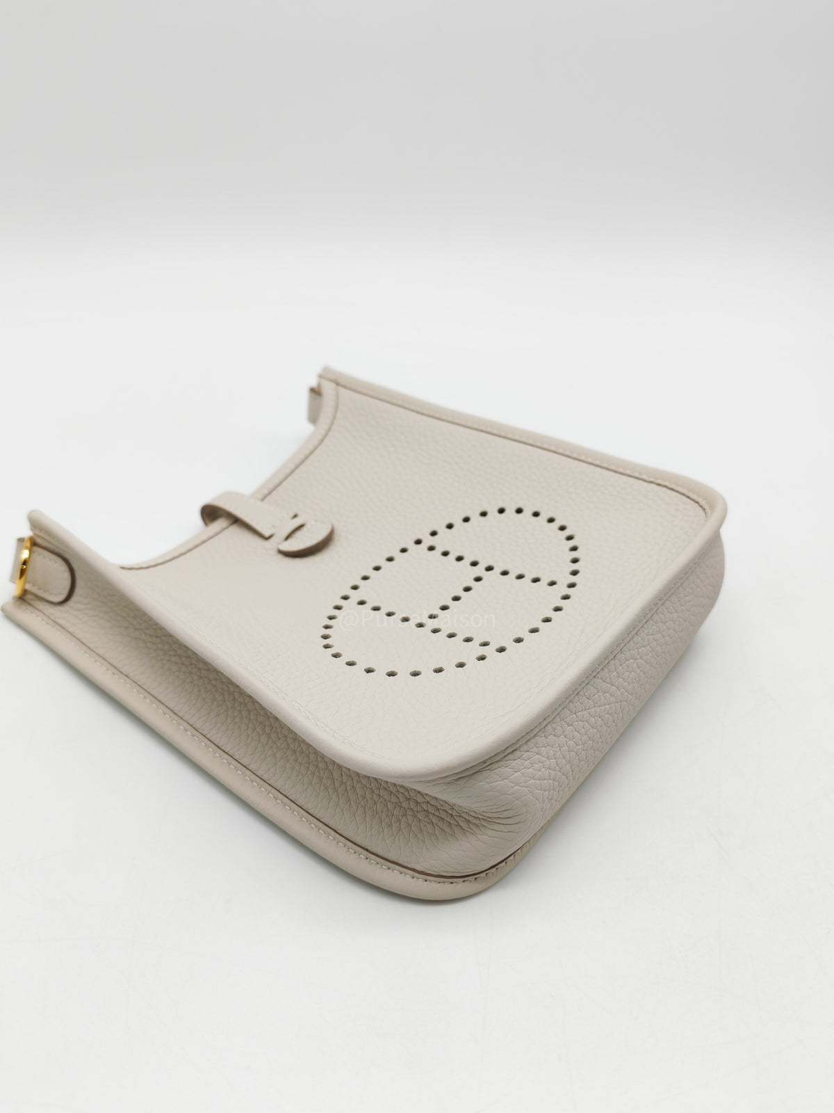 Hermes Mini Evelyne 16 TPM in Craie Clemence Leather and Gold Hardware Stamp W (2024) | Purse Maison Luxury Bags Shop