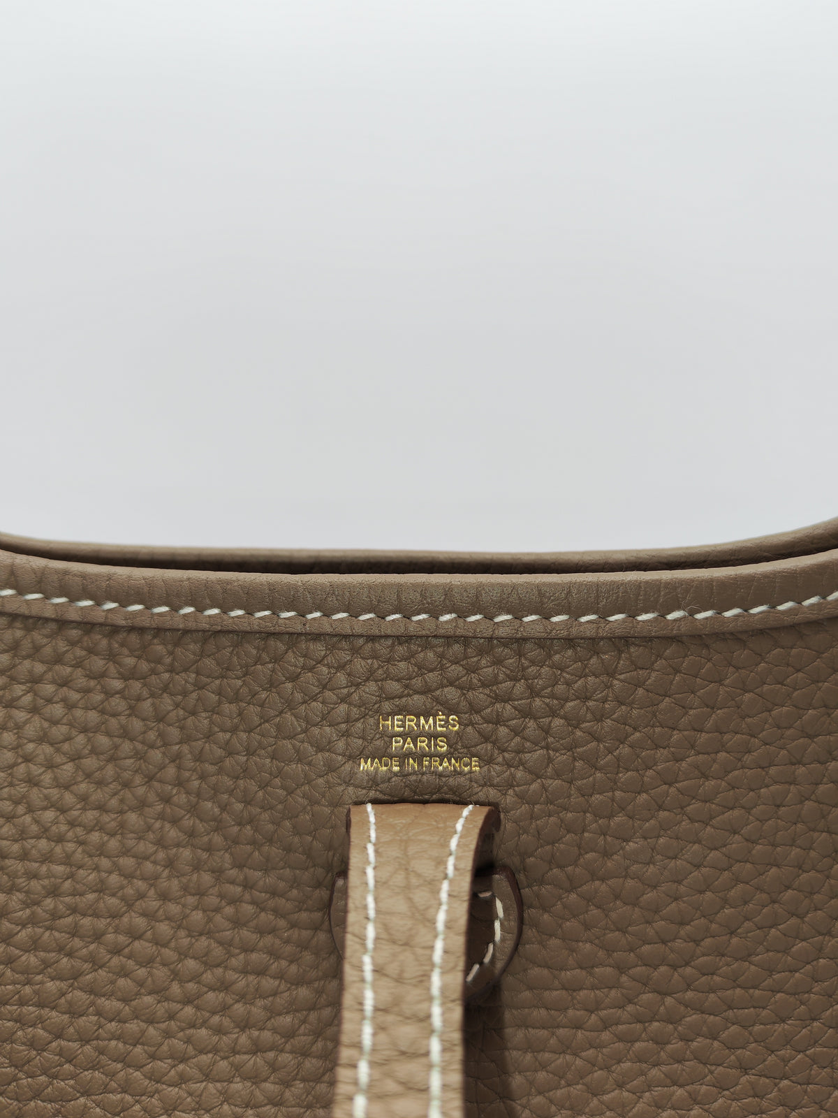 Hermes Mini Evelyne TPM in Etoupe Clemence Leather with Navy Blue Strap Palladium Hardware Stamp K(2025) | Purse Maison Luxury Bags Shop