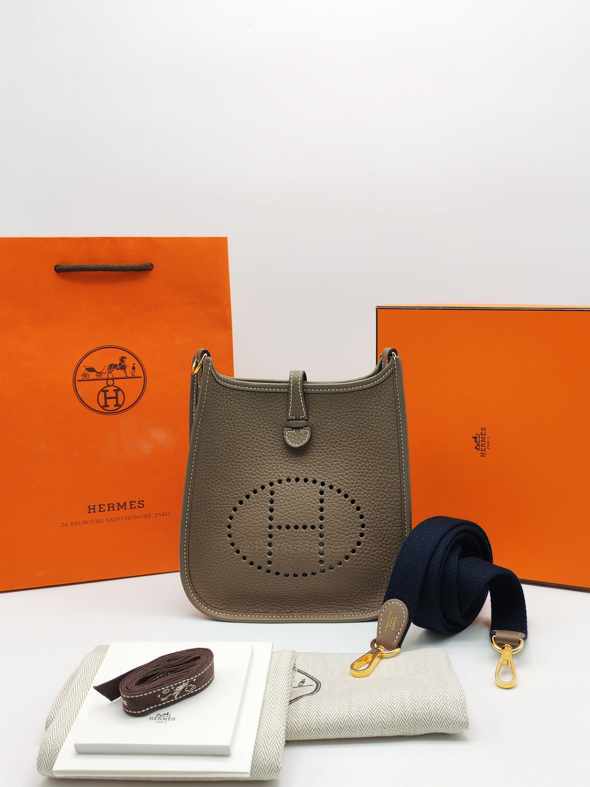 Hermes Mini Evelyne TPM in Etoupe Clemence Leather with Navy Blue Strap Palladium Hardware Stamp K(2025) | Purse Maison Luxury Bags Shop