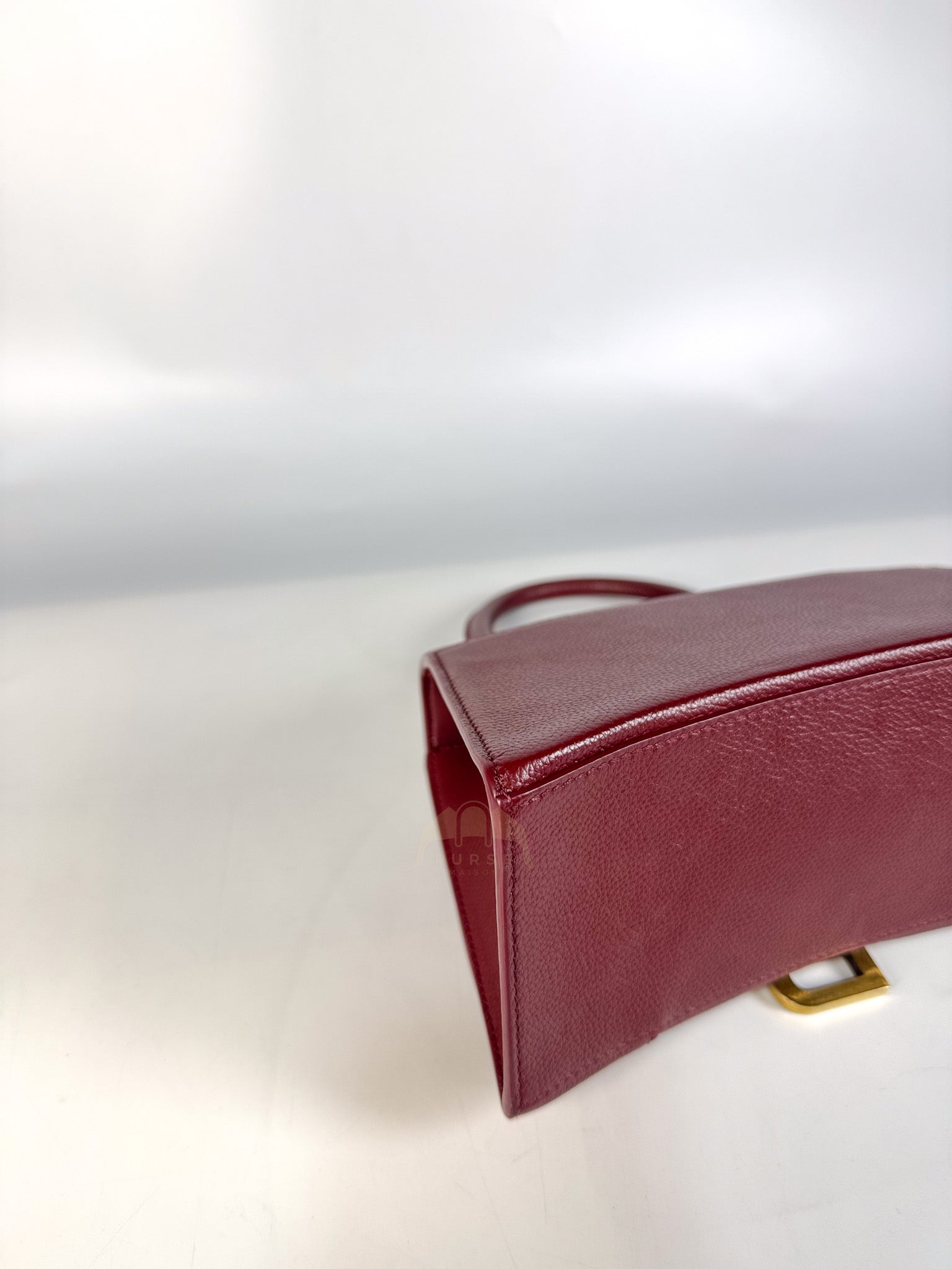 Hourglass Small in Dark Red Grained Leather | Purse Maison Luxury Bags Shop