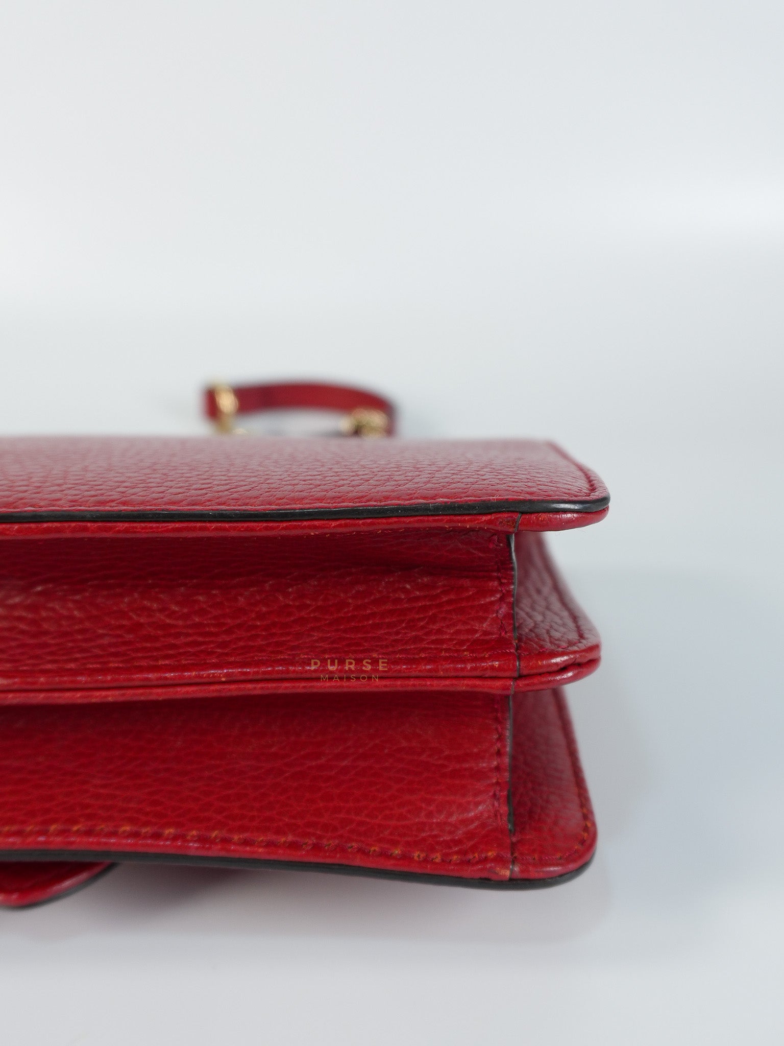 Interlocking G Dollar in Red Grained Calfskin Leather | Purse Maison Luxury Bags Shop