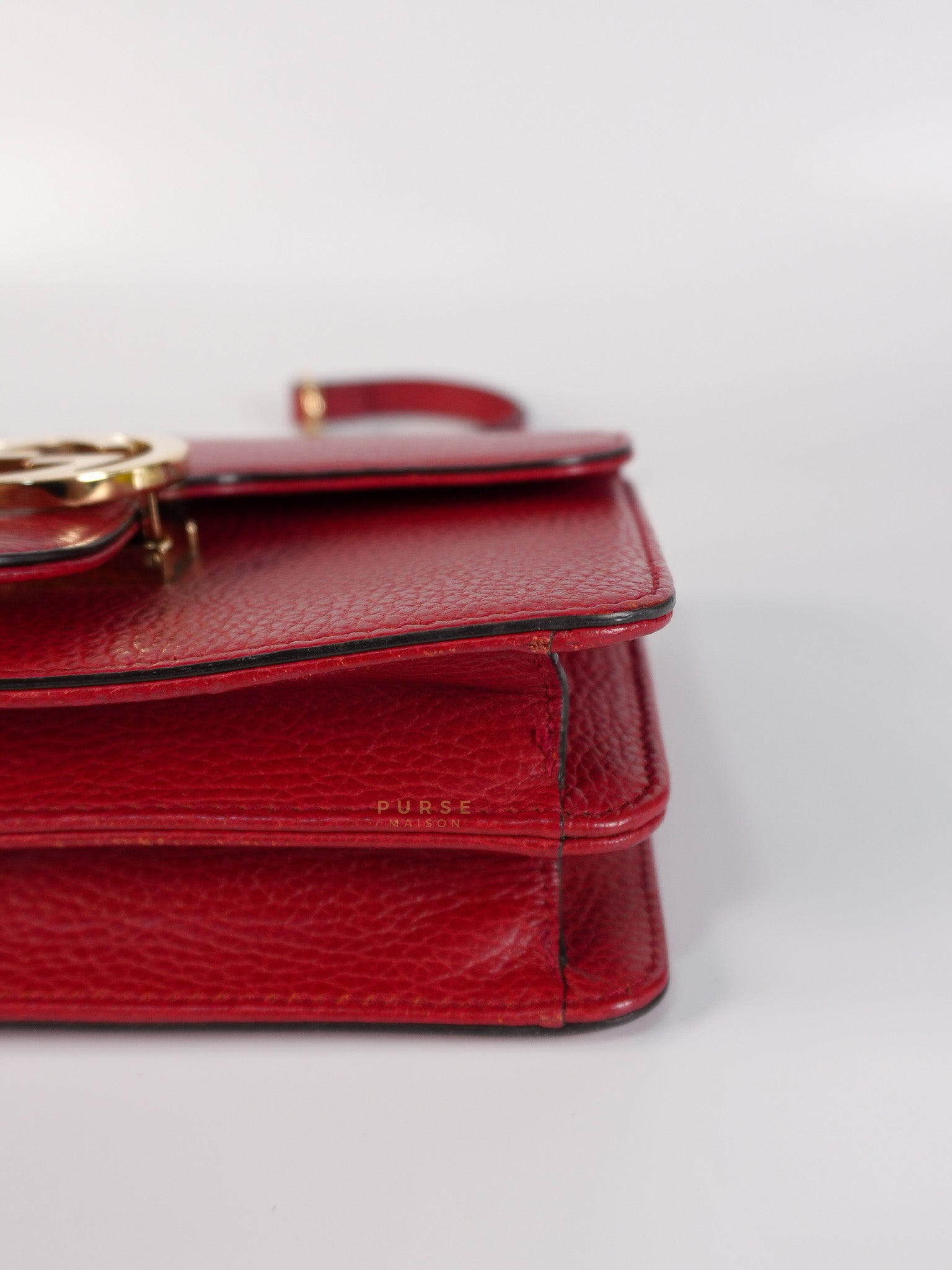 Interlocking G Dollar in Red Grained Calfskin Leather | Purse Maison Luxury Bags Shop