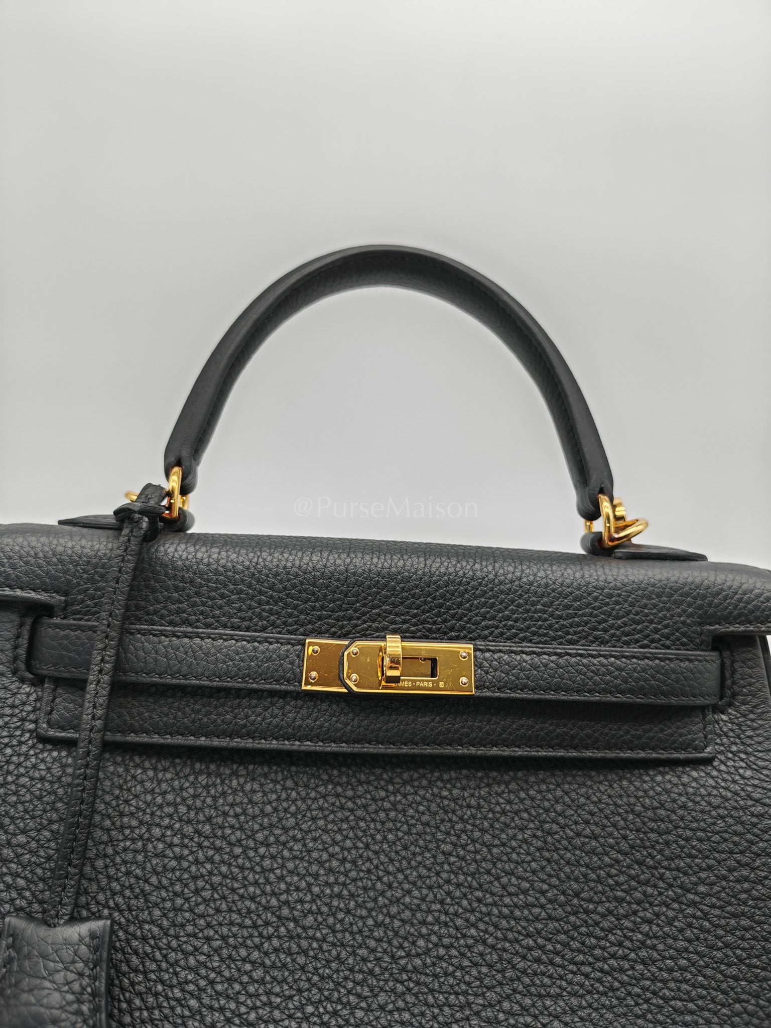 Kelly 25 Retourne Black in Togo Leather and Gold Hardware Stamp B (2023) | Purse Maison Luxury Bags Shop