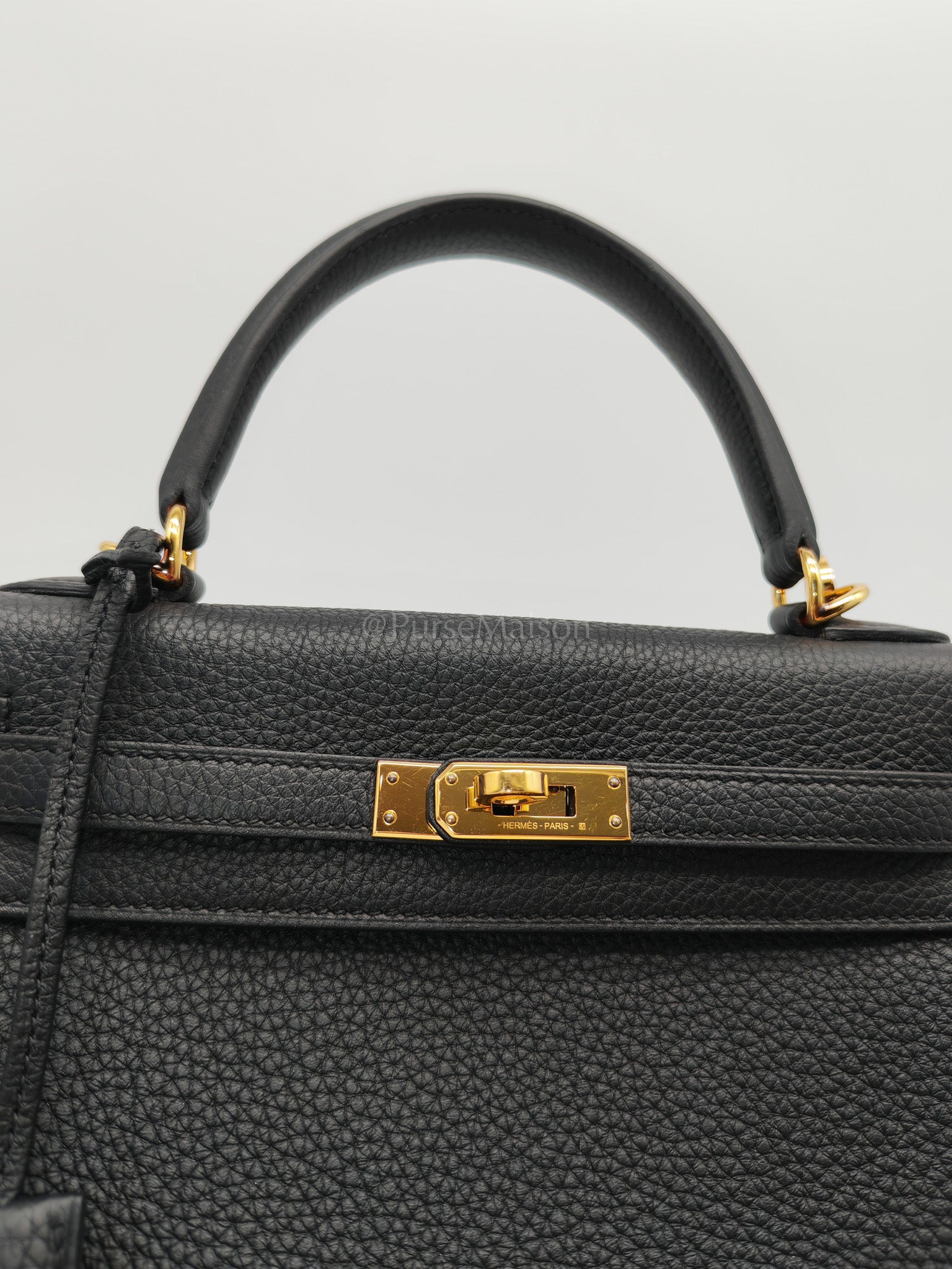 Kelly 25 Retourne Black in Togo Leather and Gold Hardware Stamp B (2023) | Purse Maison Luxury Bags Shop