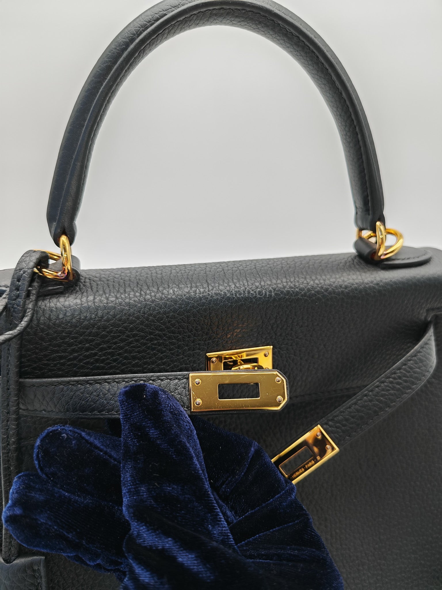 Kelly 25 Retourne Black in Togo Leather and Gold Hardware Stamp B (2023) | Purse Maison Luxury Bags Shop
