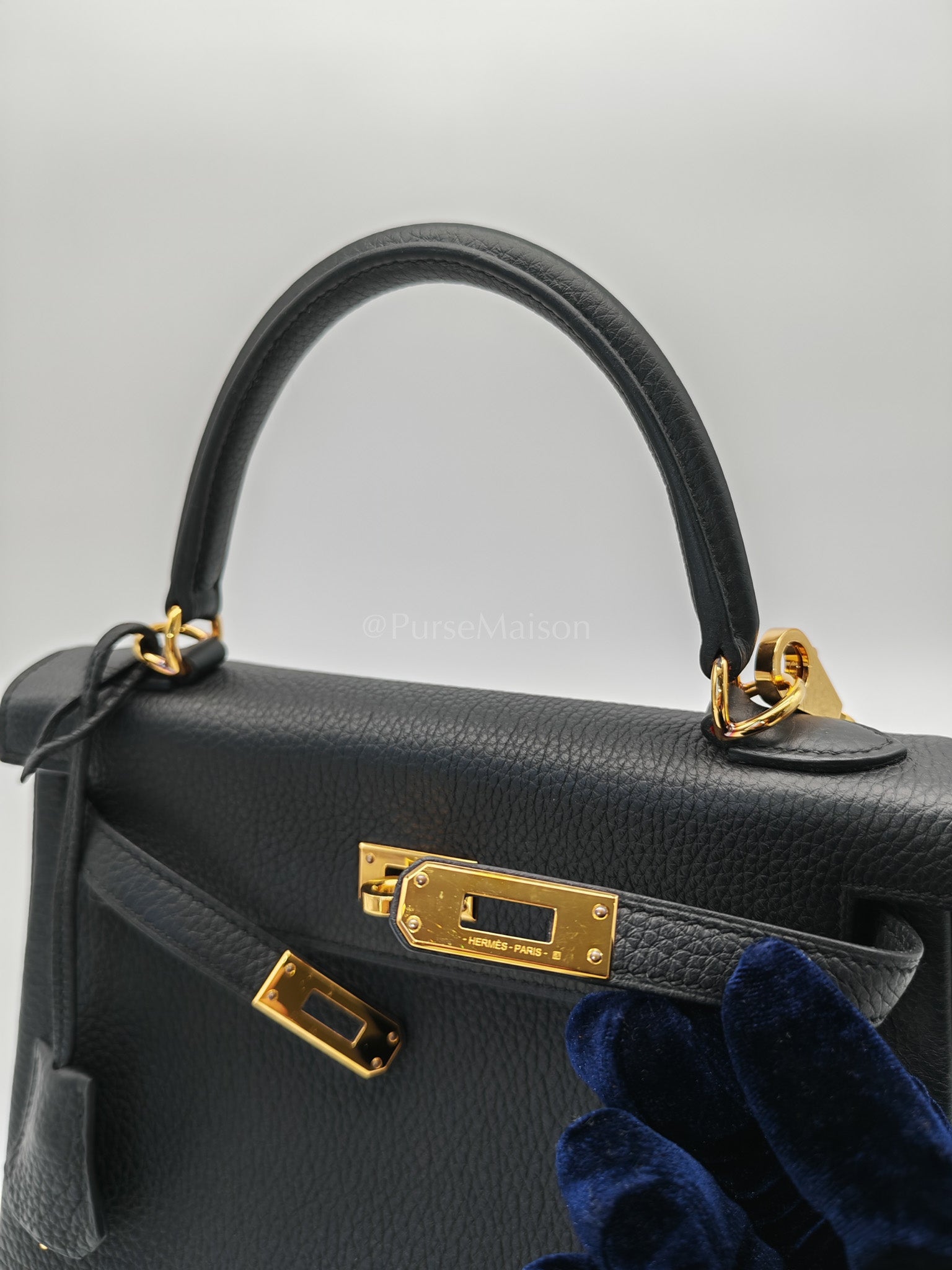 Kelly 25 Retourne Black in Togo Leather and Gold Hardware Stamp B (2023) | Purse Maison Luxury Bags Shop