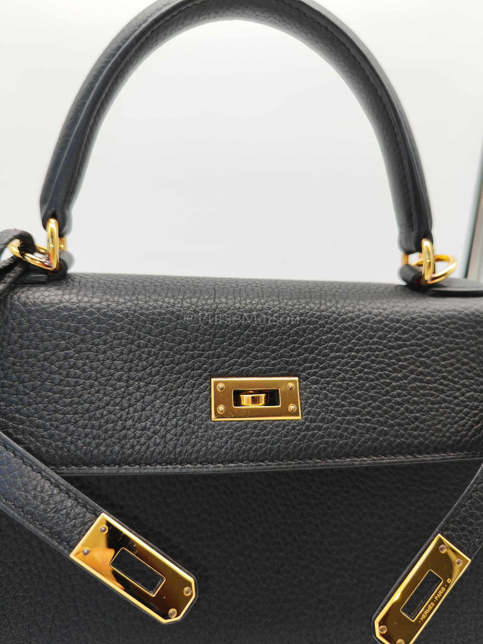 Kelly 25 Retourne Black in Togo Leather and Gold Hardware Stamp B (2023) | Purse Maison Luxury Bags Shop