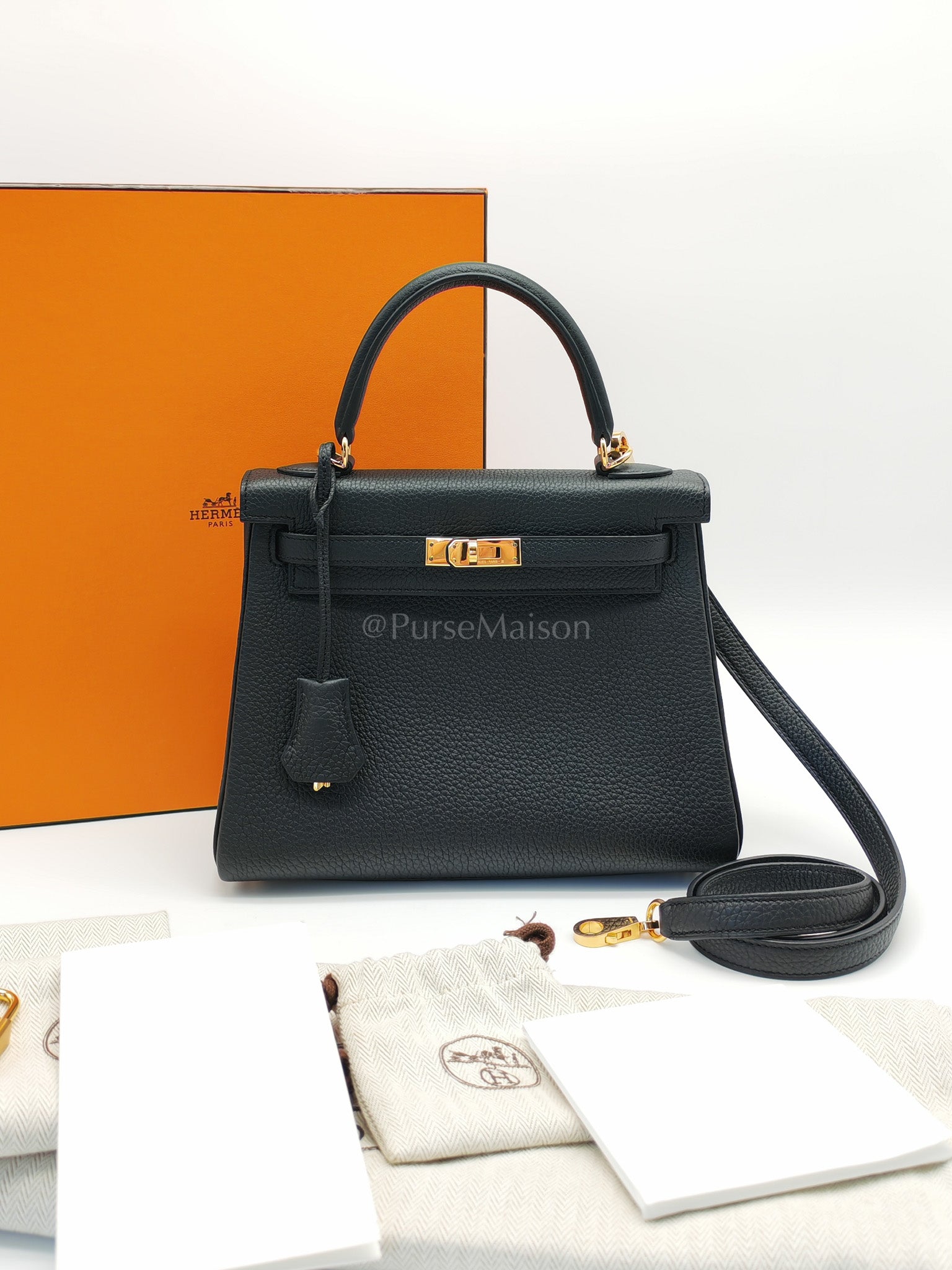 Kelly 25 Retourne Black in Togo Leather and Gold Hardware Stamp B (2023) | Purse Maison Luxury Bags Shop