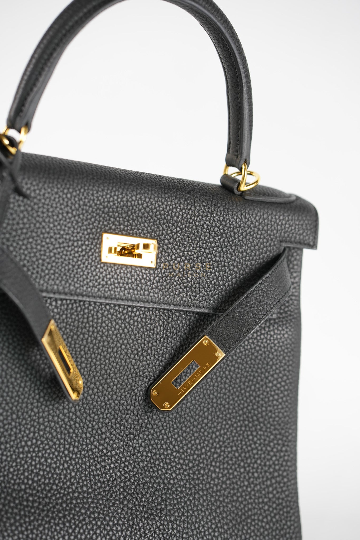 Kelly 28 Retourne in Black Togo Leather in Gold Hardware Stamp X (2016) | Purse Maison Luxury Bags Shop